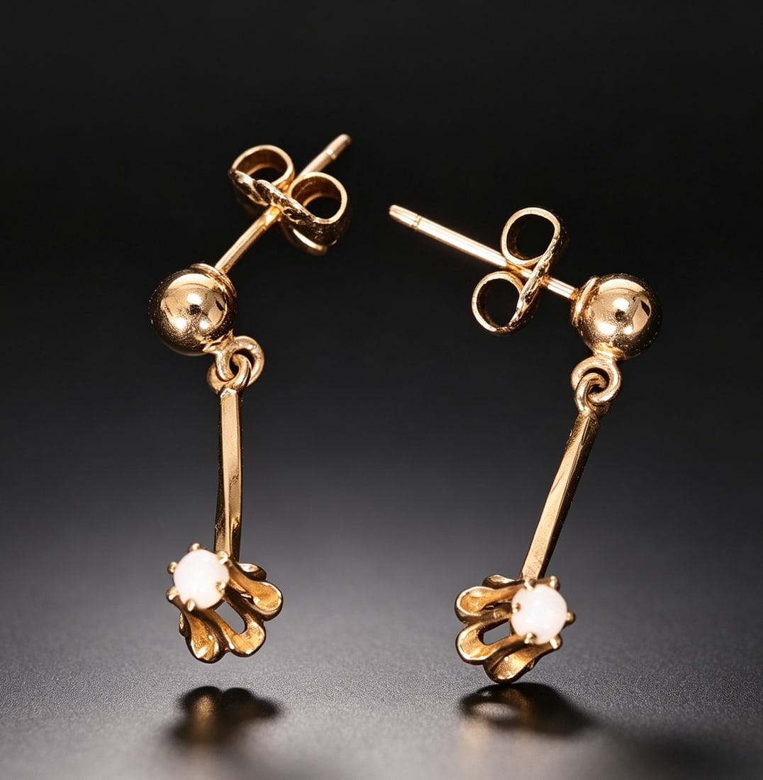14K Yellow Gold White Opal Drop Pierced Earrings: 14K Yellow Gold White Opal Drop Pierced Earrings (1.8 x 0.4 x 0.5 cm each, 1.4 grams weight)