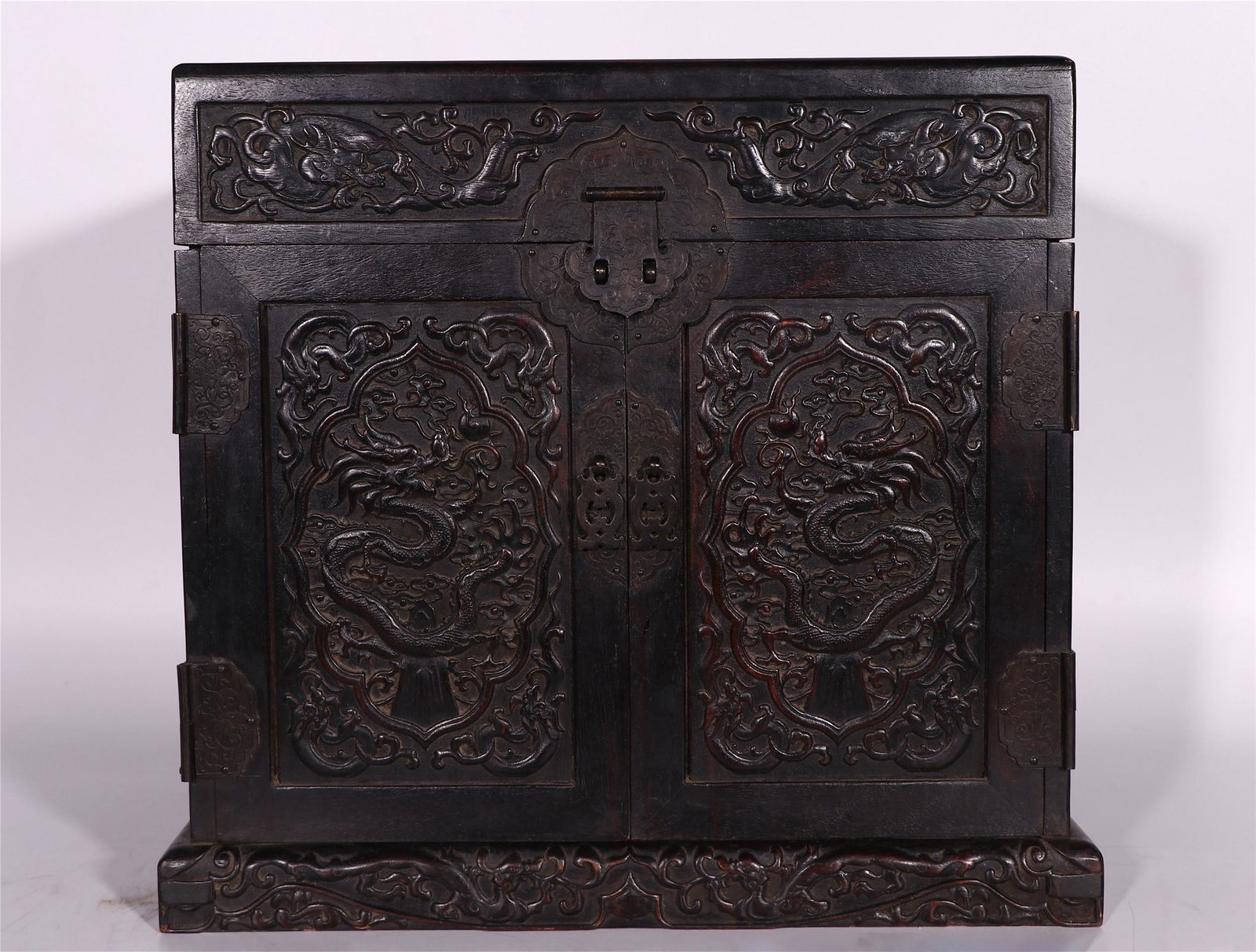 A CHINESE ZITAN WOOD STORAGE BOX CARVED WITH DRAGONS (1 of 10)