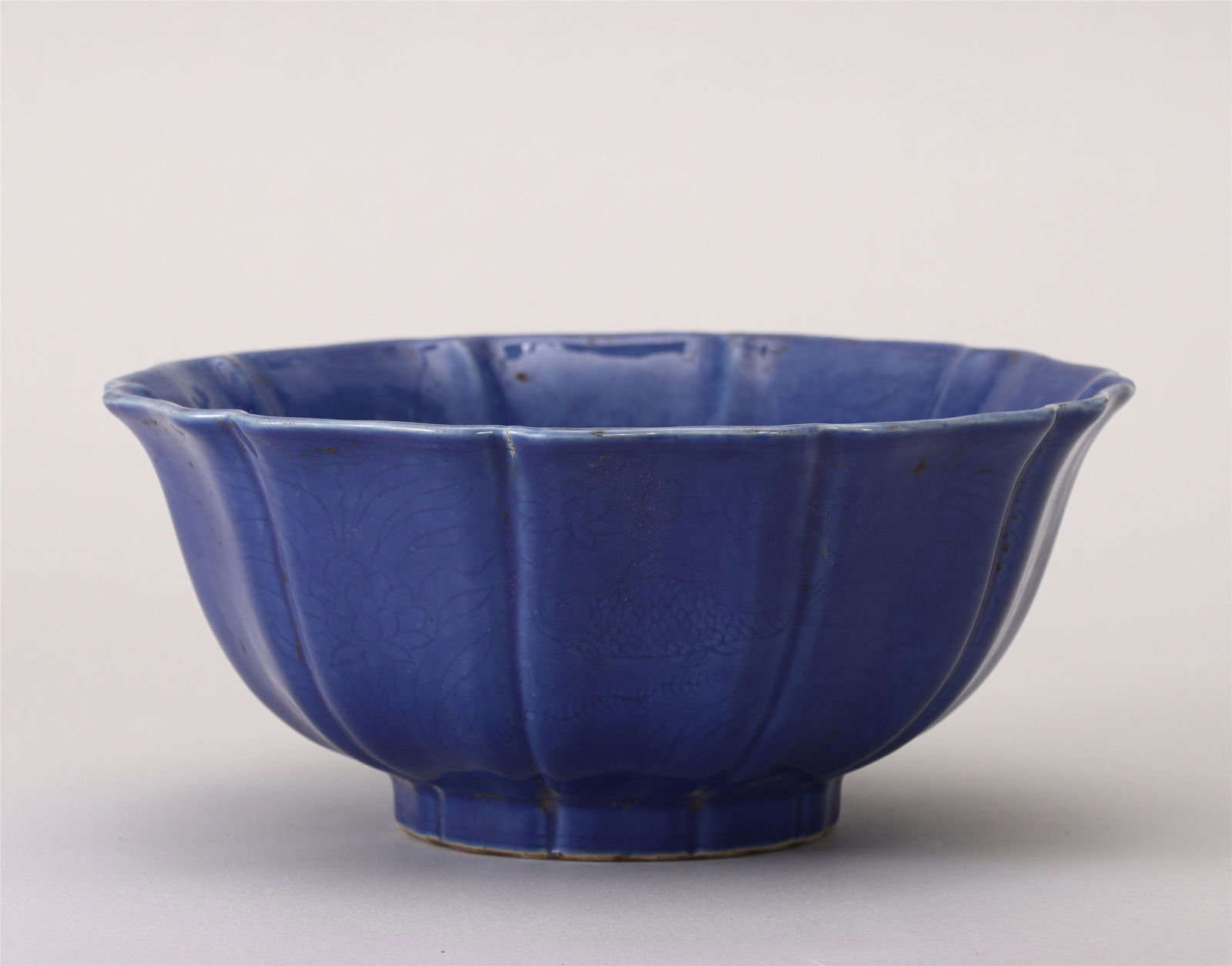 A Blue and White Incised Fish and Lotus Porcelain Bowl (1 of 6)