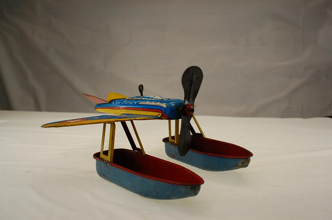 VINTAGE -OHIO ART COMPANY-TIN-WIND-UP PONTOON-SEA (1 of 5)