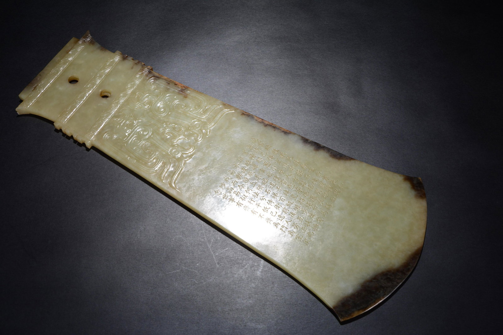 A Chinese green celadon carving of an axe (1 of 9)