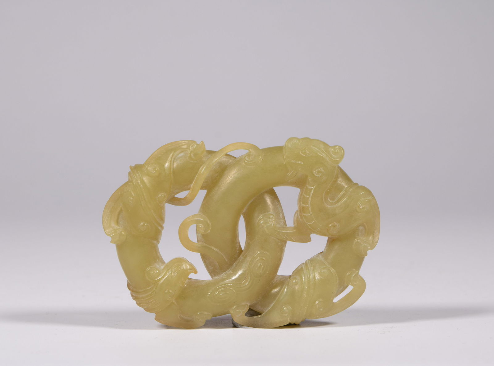 A Chinese celadon jade carving of a 'Dragon and (1 of 6)
