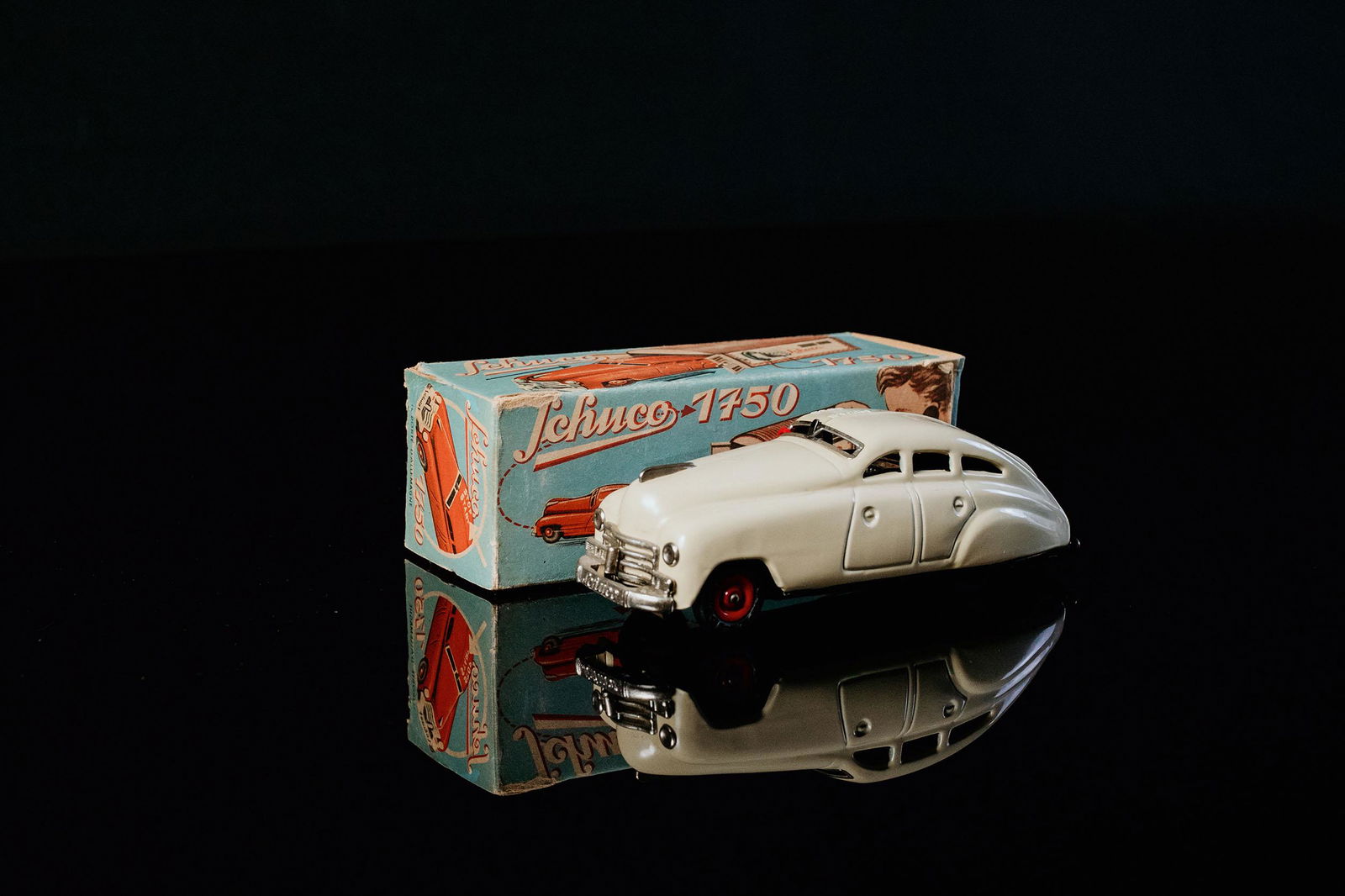 Schuco Garagenauto 1750: Tin toy, clockwork drive, function tested, hand-painted, beige, U.S. - Zone, 1955-1962, L 14,5 cm, mint, perfect condition, chrome parts very good, base plate lithographed, box perfectBlechspielzeug,
