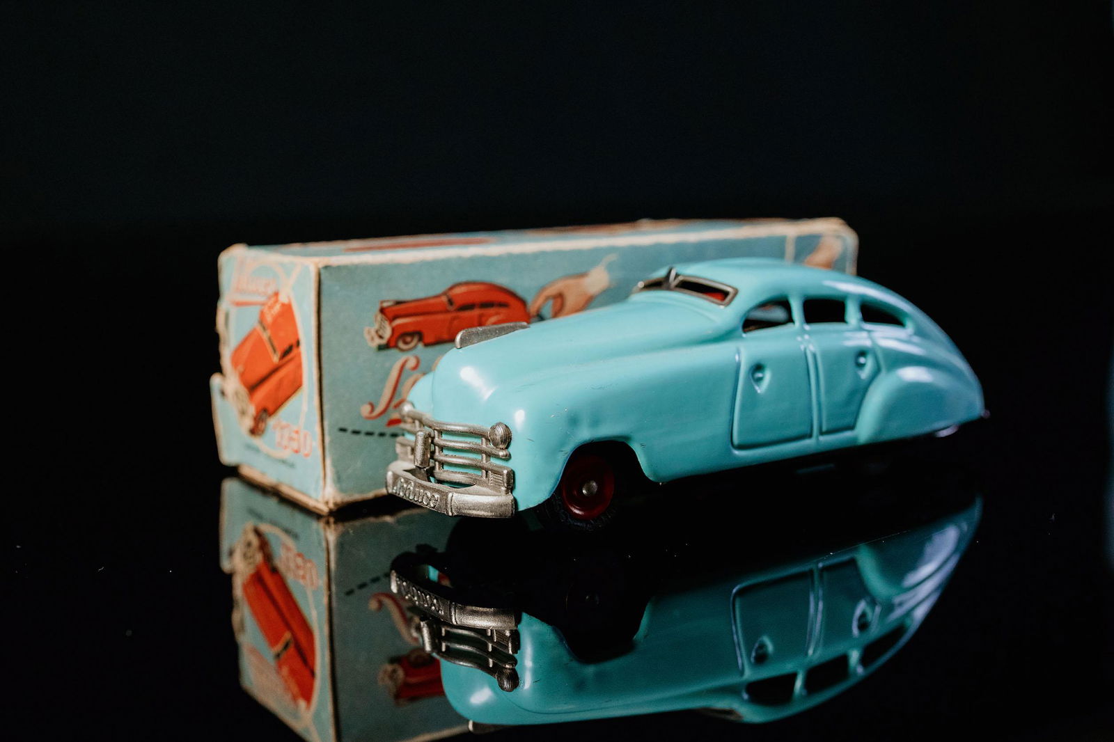 Schuco Garagenauto 1750: Tin toy, clockwork drive, function tested, hand-painted, light blue, U.S. - Zone, around 1955 to 1962, L 14,5 cm, very good to good original condition with slight damages , first post-war version with
