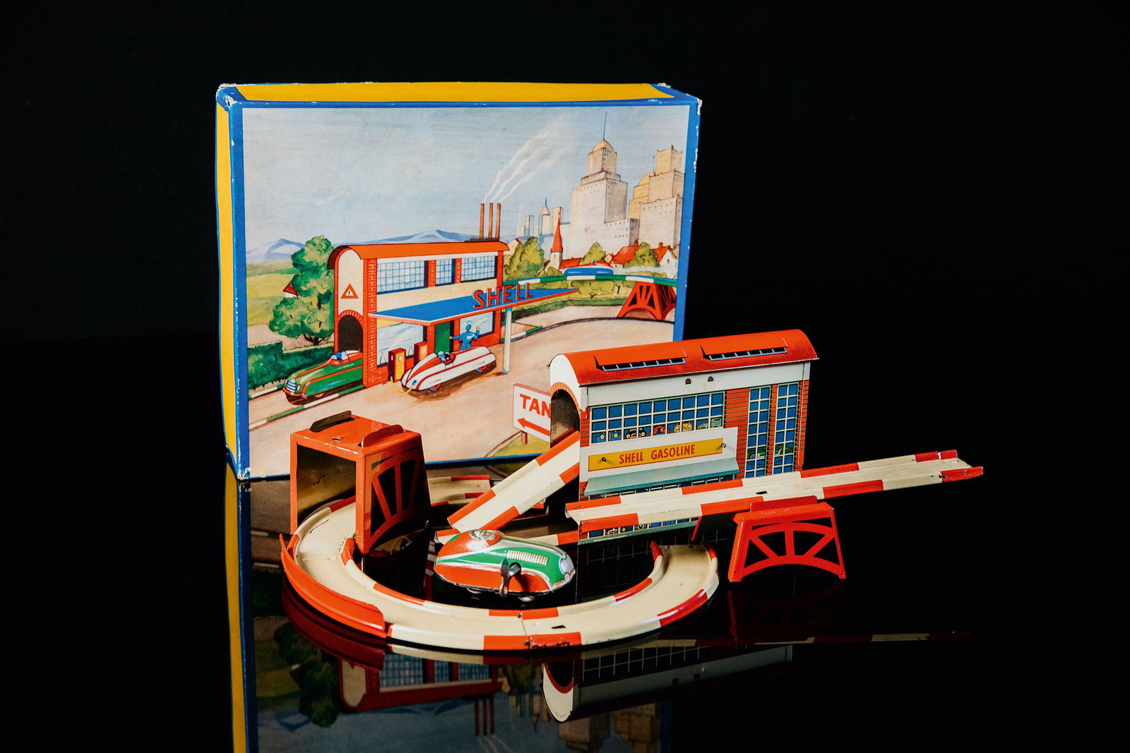 HÃ¶fler Rennbahn Shell: Tin toy, clockwork drive, function tested, lithographed, colourful, 50ies, Made in Germany, 30 cm, good condition, illustrated box, slight signs of wear and ageingBlechspielzeug, Uhrwerk-Antrieb, Funk