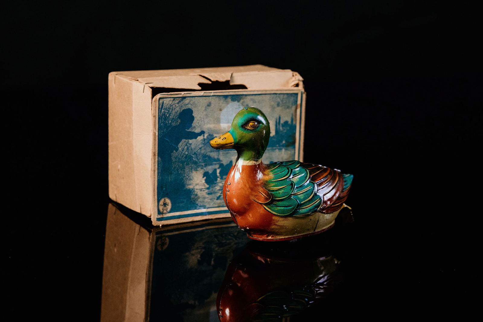 Hans Eberl. Laufente: Tin toy, clockwork drive, function tested, blue/white, 20ies, Made in Germany, 15.5 cm, good condition with slight signs of age and use, original box with loose parts, bottom plate has one soldering p