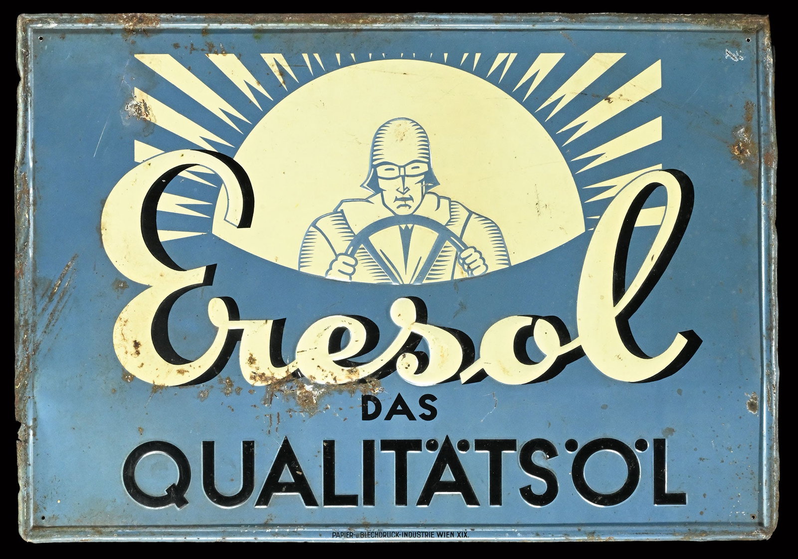 ERESOL - DAS QUALITAETSOEL | RARE 20" TIN SIGN: Tin sign, embossed and lithographed, AT around 1920, 50 x 35 cm, Papier- u. Blechdruck-Industrie Wien, the image shows a race car driver in the cockpit of his car, a rare piece with slight signs of ag