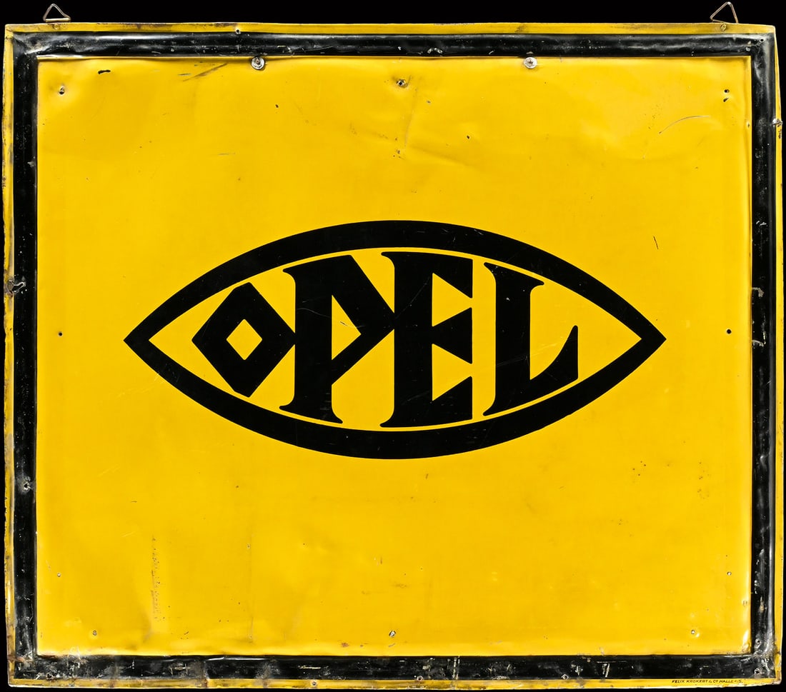 OPEL | 26" TIN SIGN: Tin sign, lithographed, GER 1920s, 65 x 55 cm, Felix Krokert & Co. Halle a/S, an ancient piece with depiction of the iconic Opel eye, the early emblem, sketched by Grand Duke Ernst Ludwig of Hessen du