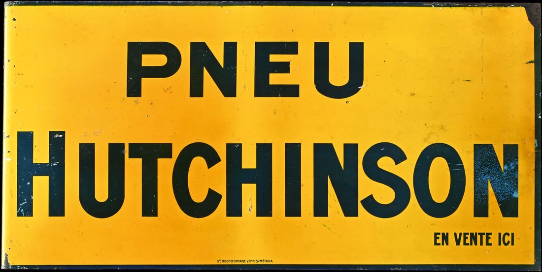 PNEU HUTCHINSON | 19" TIN SIGN | DOUBLE SIDED FLANGE: Tin sign, flange, F around 1930, 47 x 24 cm | We do only sell old original pieces - no reproductions or fakes. We pack in house, most items can be shipped overseas. Wooden crates are available. For fu