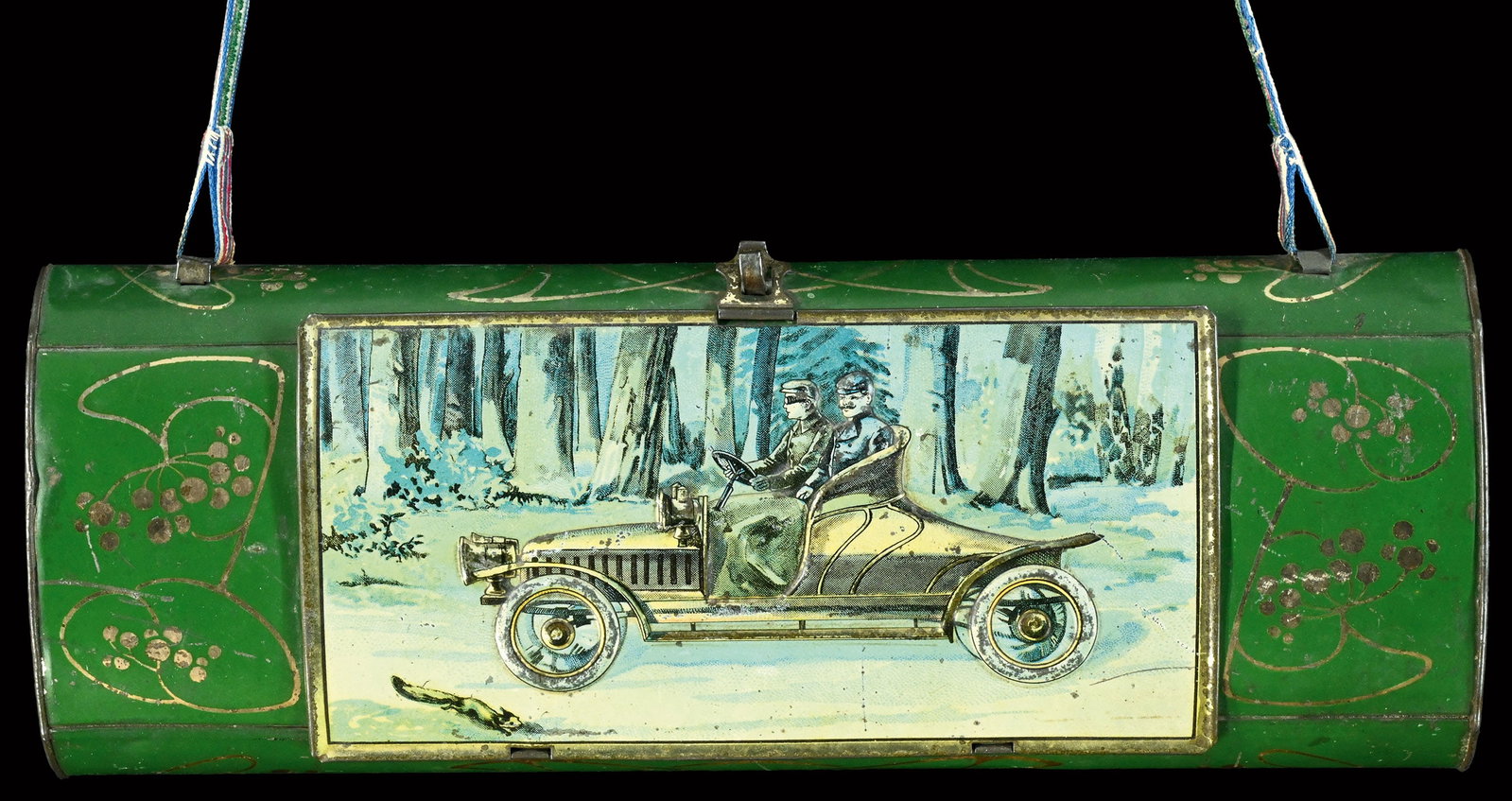 BOTANISERTROMMEL | 13": Botanical drum made of tin, lithographed and embossed motif featuring a car, around 1910, 32 x 12 cm, still with the original shoulder strap, originally used for collecting plants and insects | We do 