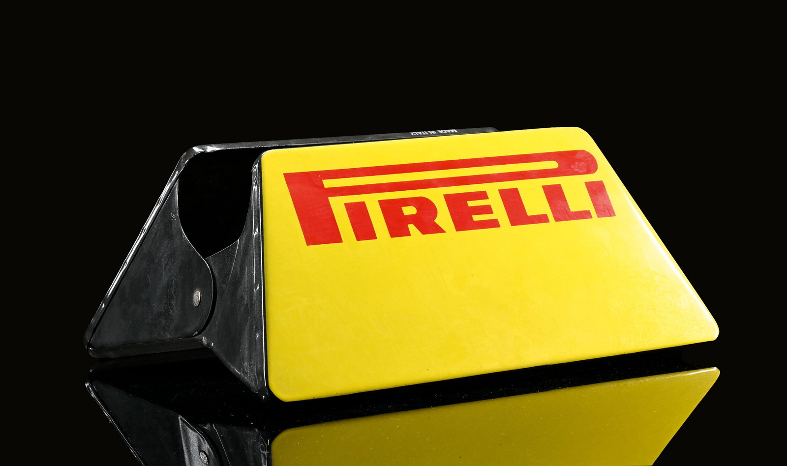 PIRELLI | 8" TIRE STAND: TIRE STAND enameled, IT 1950s, 38 x 26 cm, H 20 cm, Smalterie Lombarde, Milano | We do only sell old original pieces - no reproductions or fakes. We pack in house, most items can be shipped overseas. 
