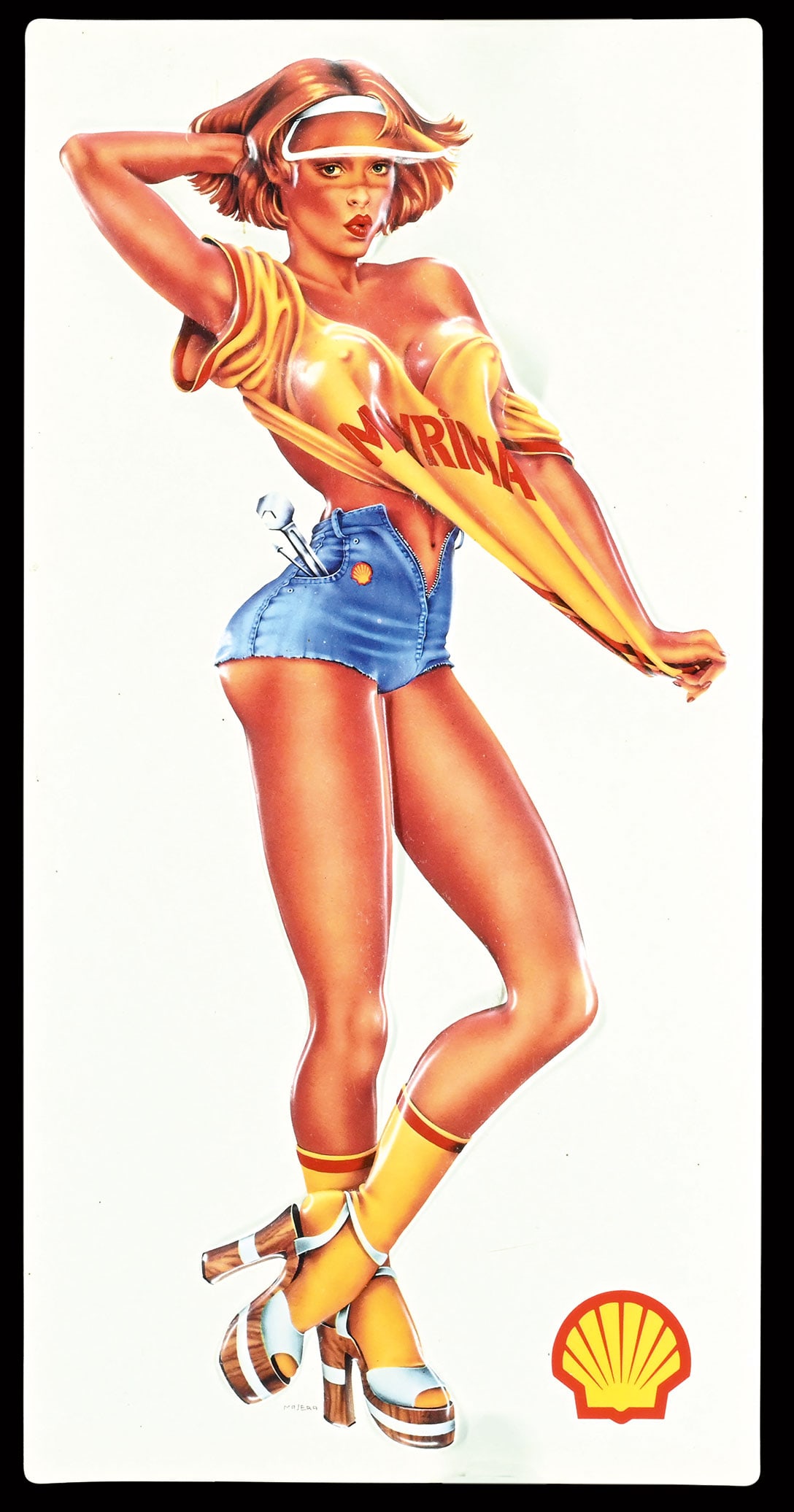 SHELL MYRINA | MAGNIFICIENT 17" PIN UP | SUPERB CONDITION: Pin Up, plastic, embossed, F 1970s, 22 x 44 cm, signed: Majera, an absolute rarity, we are not aware of a second piece in this condition. The artists signature hides between the heels, beautiful relie