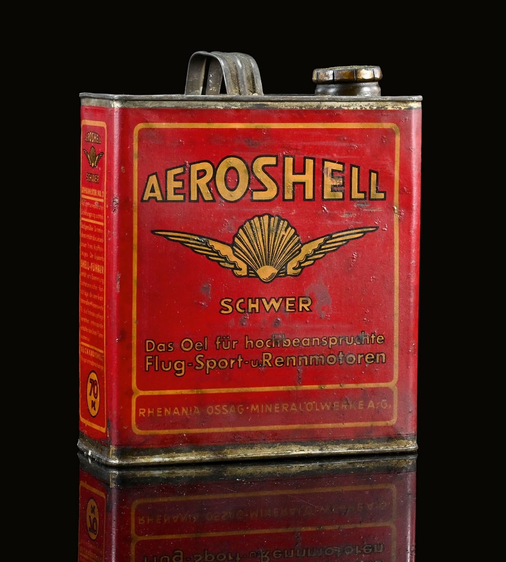 AEROSHELL SCHWER | OIL CAN: Oil can, tin, filling capacity 2 l, GER around 1930, H 20 cm, one of the rare cans that were equipped with a paper label after being sent back, still with the original click cap | We do only sell old 