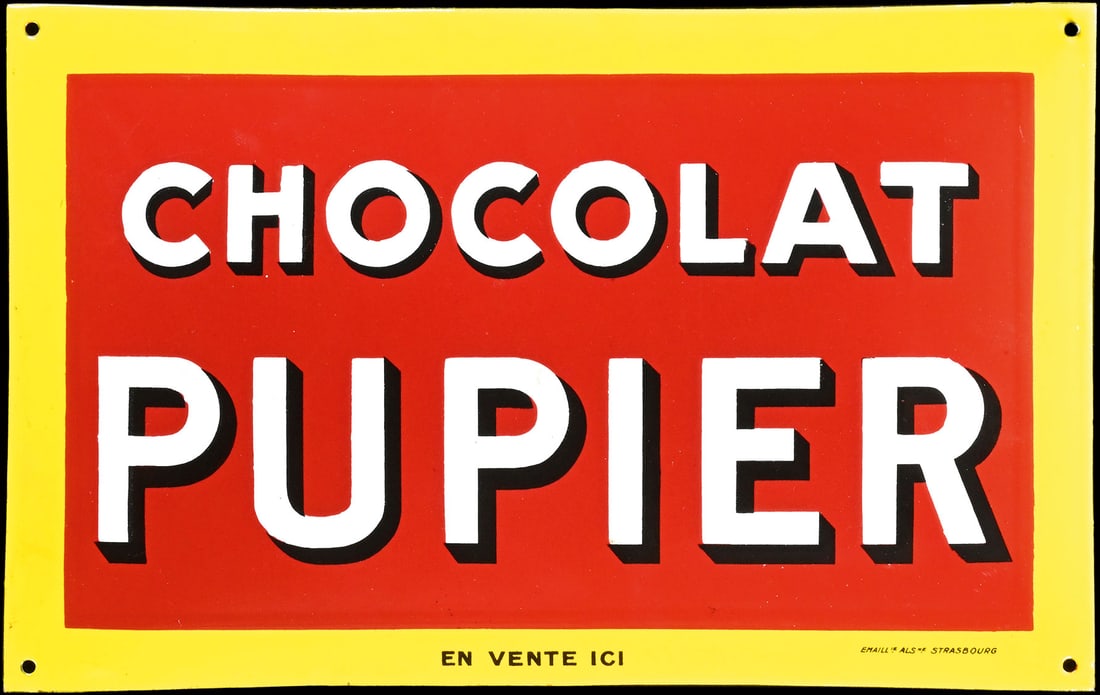 CHOCOLAT PUPIER | PORCELAIN SIGN | (1+): Porcelain sign ( Enamel sign ), convex, stenciled, F around 1930, 43 x 27 cm, Emaill. Als. Strasbourg, not only Swiss chocolate collectors know the beauty of such signs with only text. With fresh surf