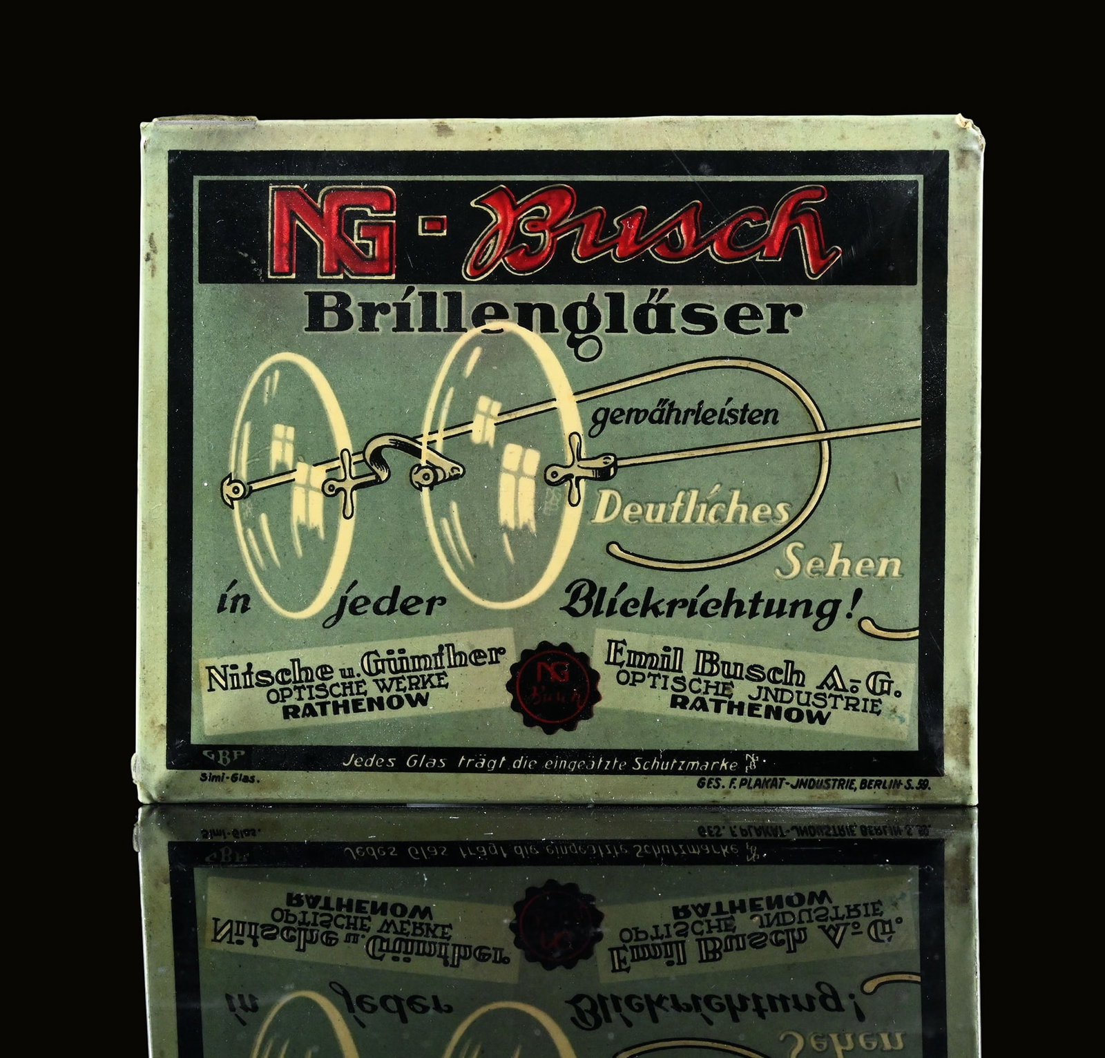 NG-BUSCH | TIN SIGN | (2+): Tin sign with celluloid coating, lithpgraphed, GER around 1920, 13 x 11 cm, Ges. f. Plakat-Industrie, Berlin | We do only sell old original pieces - no reproductions or fakes. We pack in house, most i