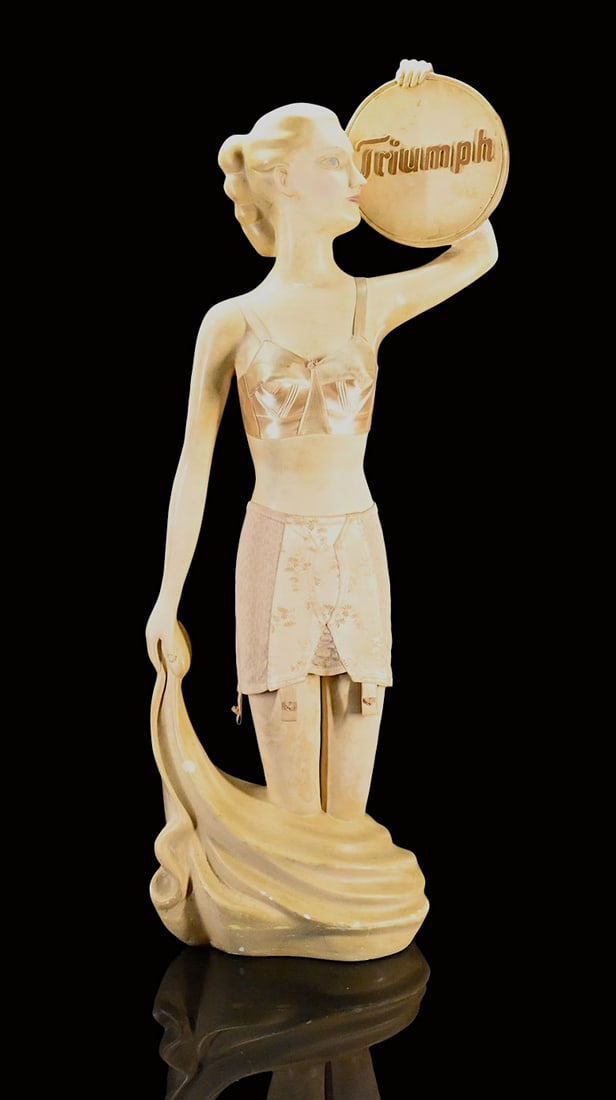 TRIUMPH | ADVERTISING FIGURE | (3): Advertising model, plaster, original cloth, GER around 1930, H 88 cm, slightly faded, tear on the neck and arm, the arm has a bigger touch-up| *Pickup only, delivery is available by prior arrangement,