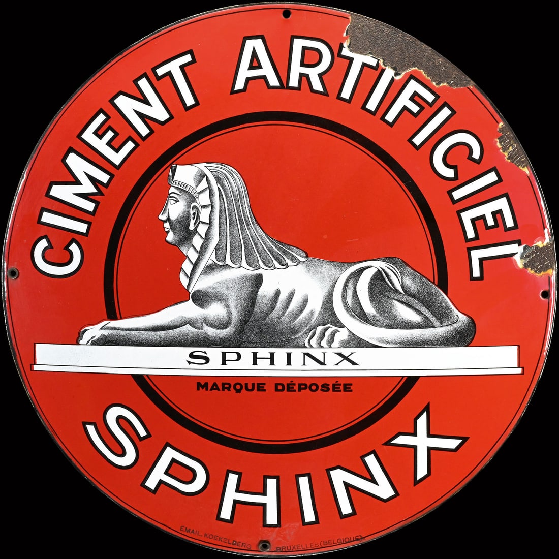 SPHINX CIMENT ARTIFICIEL | PORCELAIN SIGN | (2): Porcelain sign ( Enamel sign ), convex, stenciled, the Sphinx itself in fine lithograph, BE 1920s, diam. 50 cm | We do only sell old original pieces - no reproductions or fakes. We pack in house, most