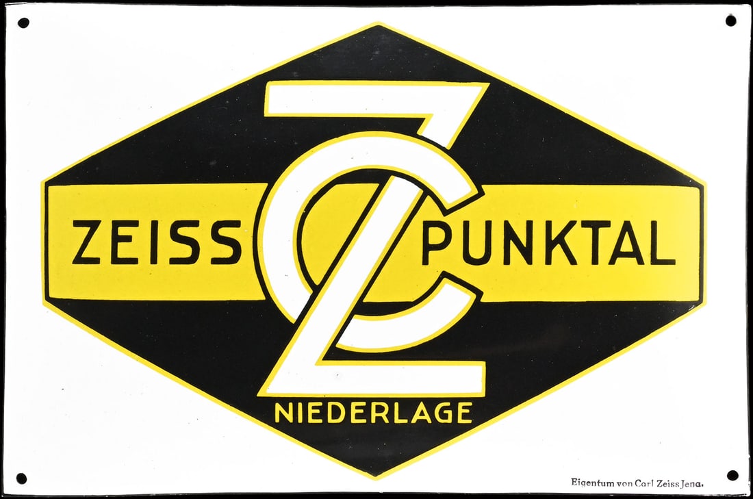 ZEISS PUNKTAL NIEDERLAGE | PORCELAIN SIGN | (0-1): Porcelain sign ( Enamel sign ), convex, stenciled, GER around 1930, 38 x 25 cm | We do only sell old original pieces - no reproductions or fakes. We pack in house, most items can be shipped overseas. 