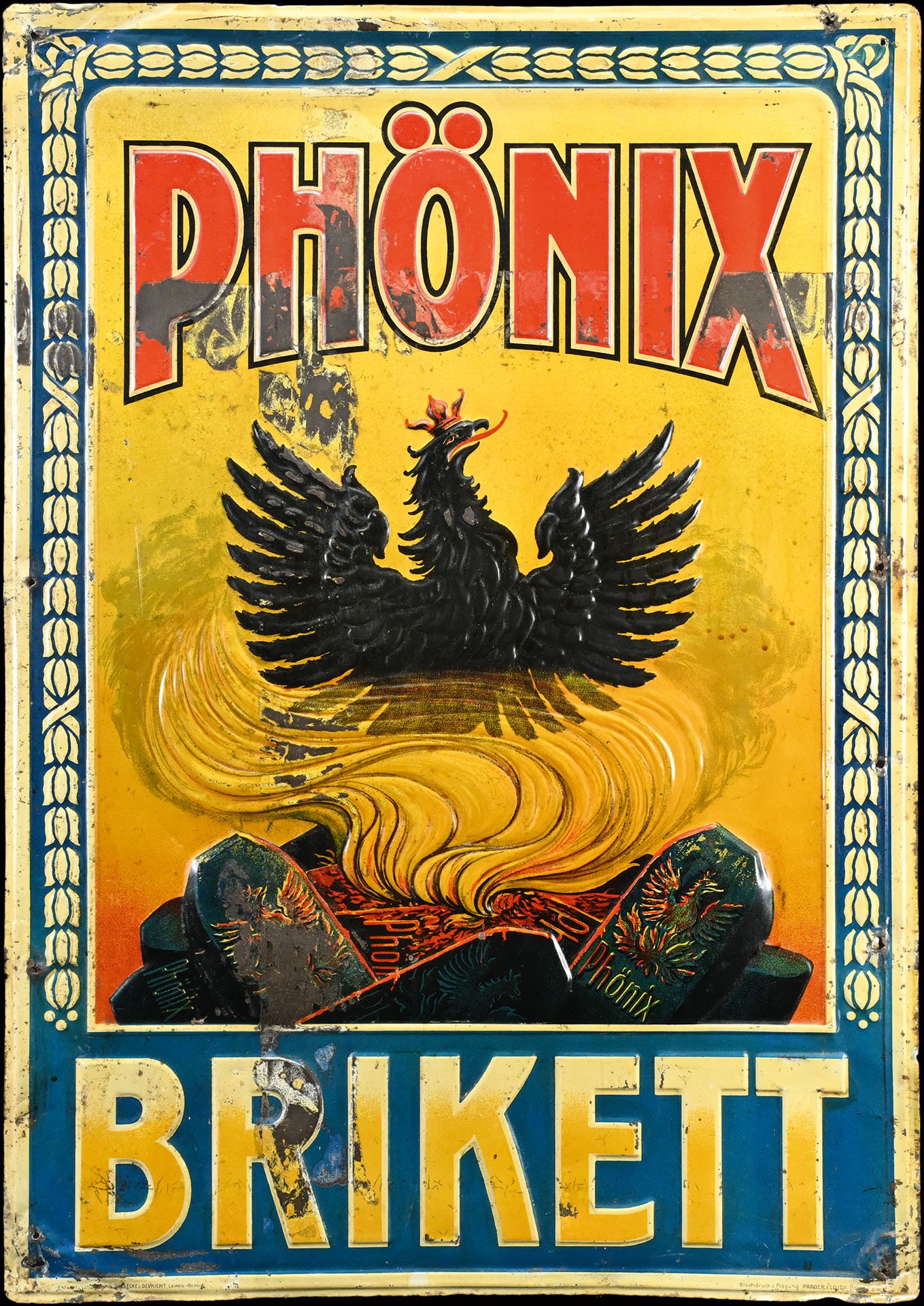 PHOENIX BRIKETT | TIN SIGN | (2-3): Tin sign, embossed and lithographed, GER around 1920, 50 x 72 cm, Blechdruck & Praegung: Prager & Lodja, Berlin, design and lithograph: Gilsecke & Devrient, Leipzig-Berlin, some traces of aging | We d
