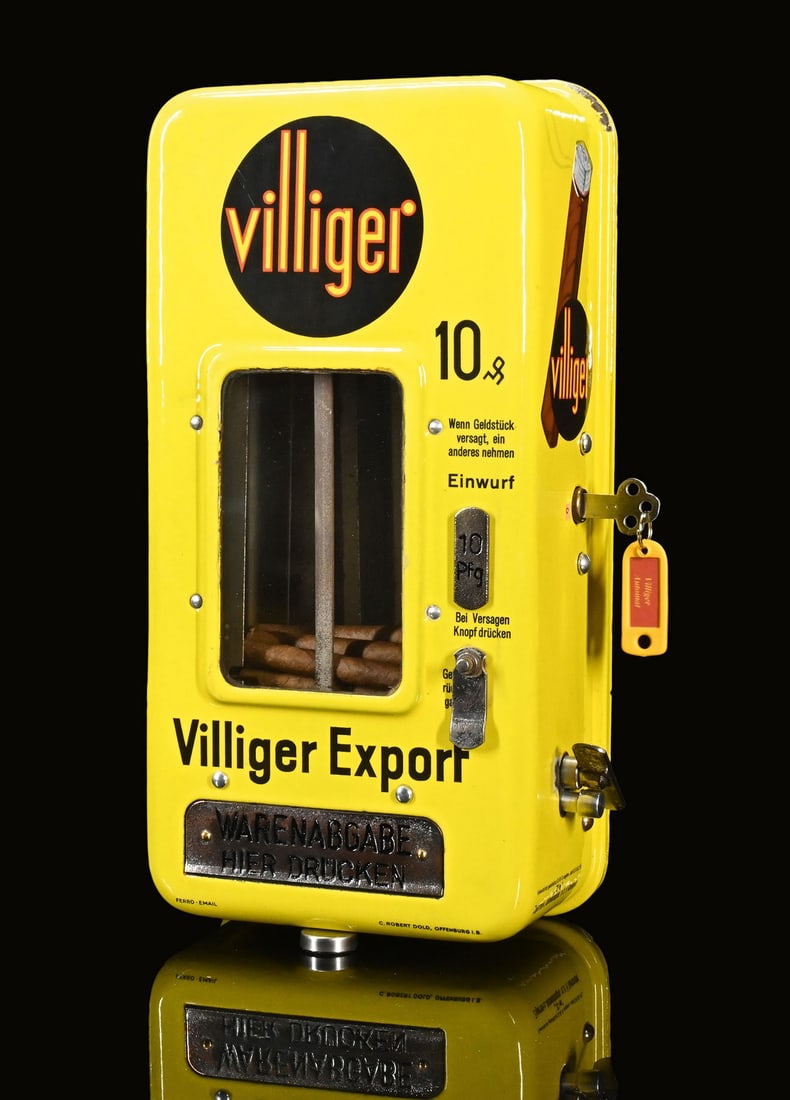 VILLIGER EXPORT | BEAUTIFUL OLD VENDING MACHINE | (1): Vending machine, enamelled corpus, stenciled, GER 1930s, H 39 cm, Ferro-Email, C. Robert Dold, Offenburg i.B., the mechanism is complete, still equipped with old cigars, key and a copy of the instruct