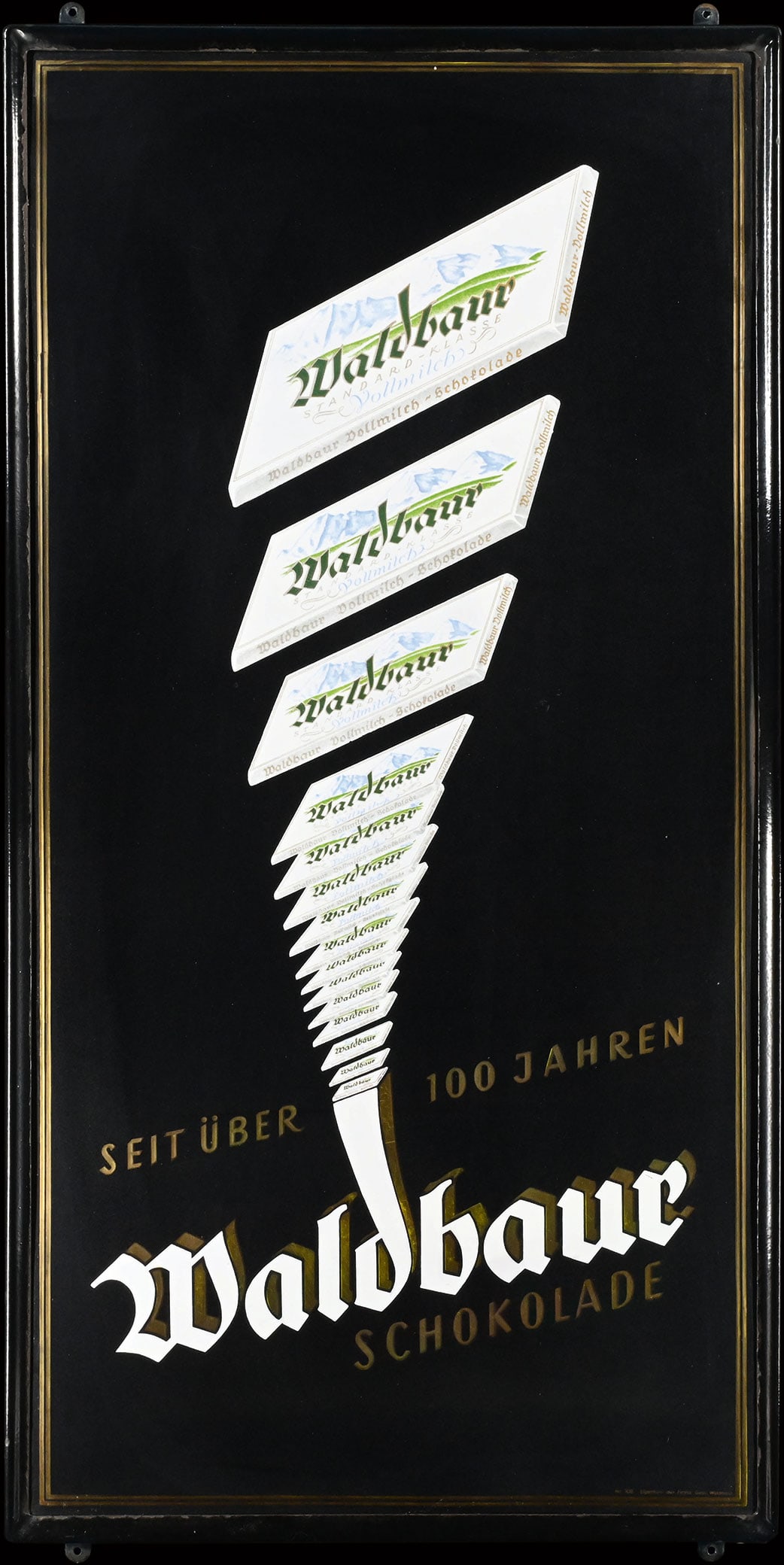 WALDBAUR SCHOKOLADE | PORCELAIN SIGN IN SUPERB CONDITION | (1+): Porcelain sign ( Enamel sign ), stenciled and lithographed, still in the original enamelled iron frame, GER around 1930, 60 x 120 cm | We do only sell old original pieces - no reproductions or fakes. 