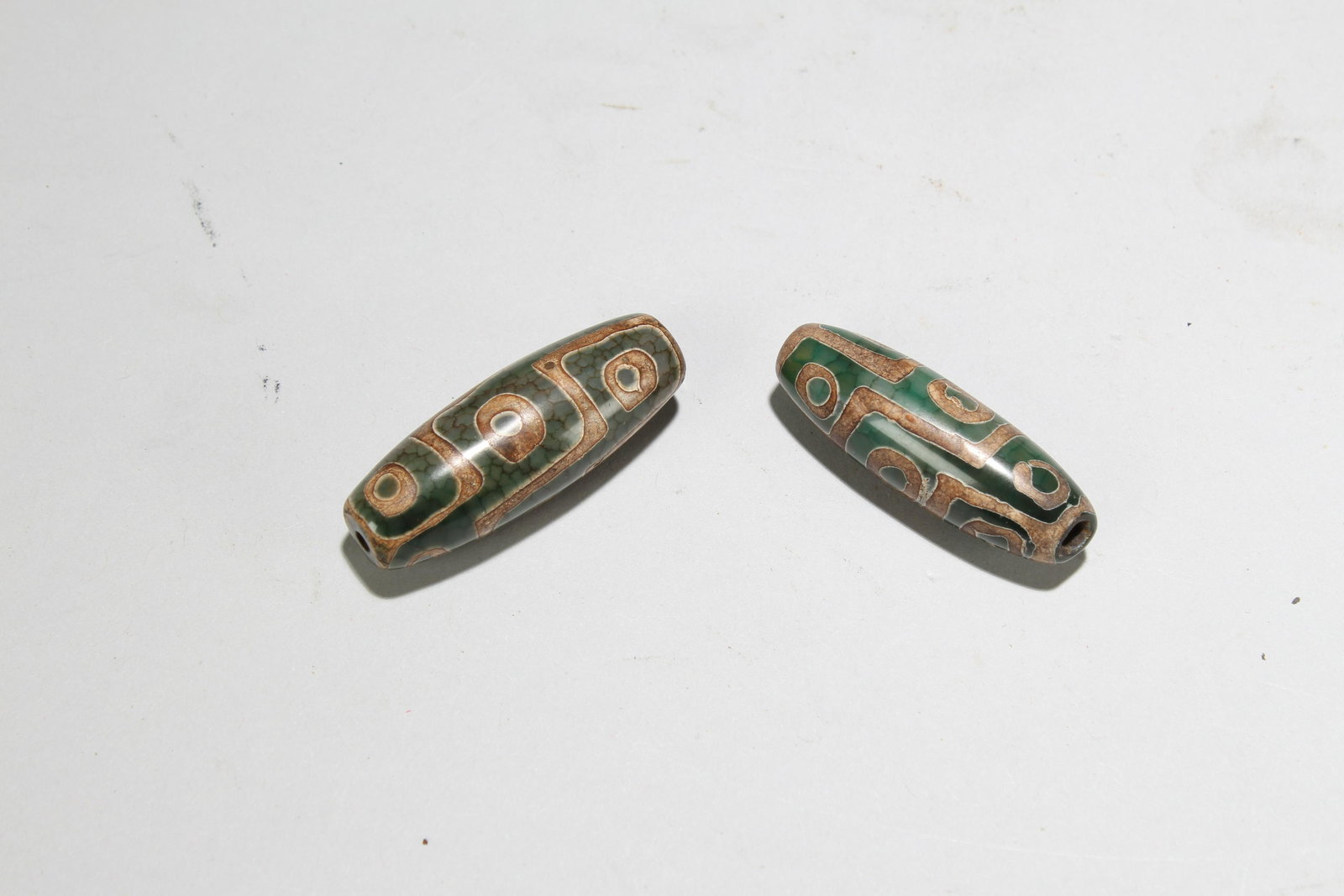 Two Tibetan Fortune Beads