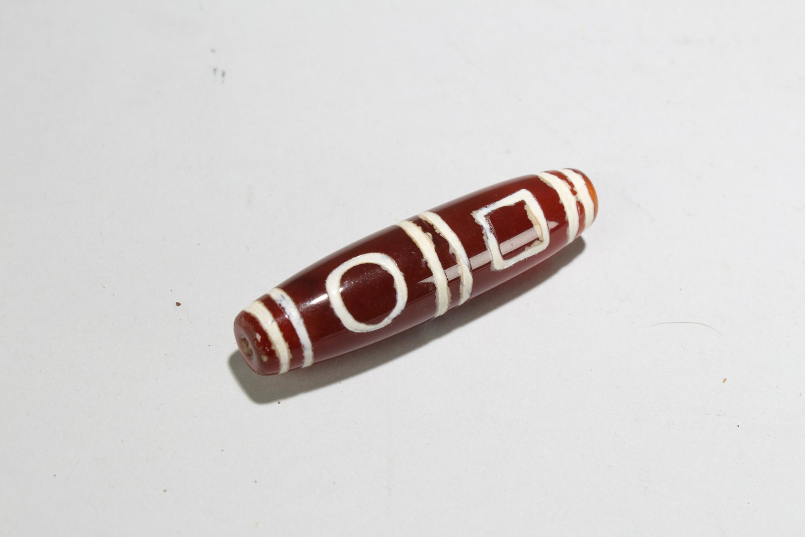 A Tibetan Fortune Dzi Bead