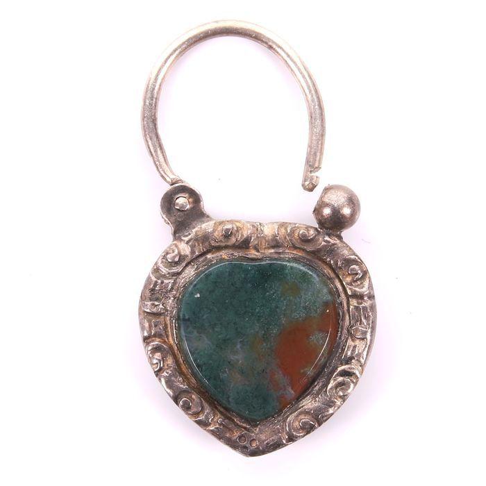 NO RESERVE PRICE Cairngorm Scottish Bloodstone Heart: 6.13 gross grams. Rare Scottish Cairngorm heart-shaped locket with Scottish thistle symbol etched on the back. Dimensions: 3.5 x 2cm.