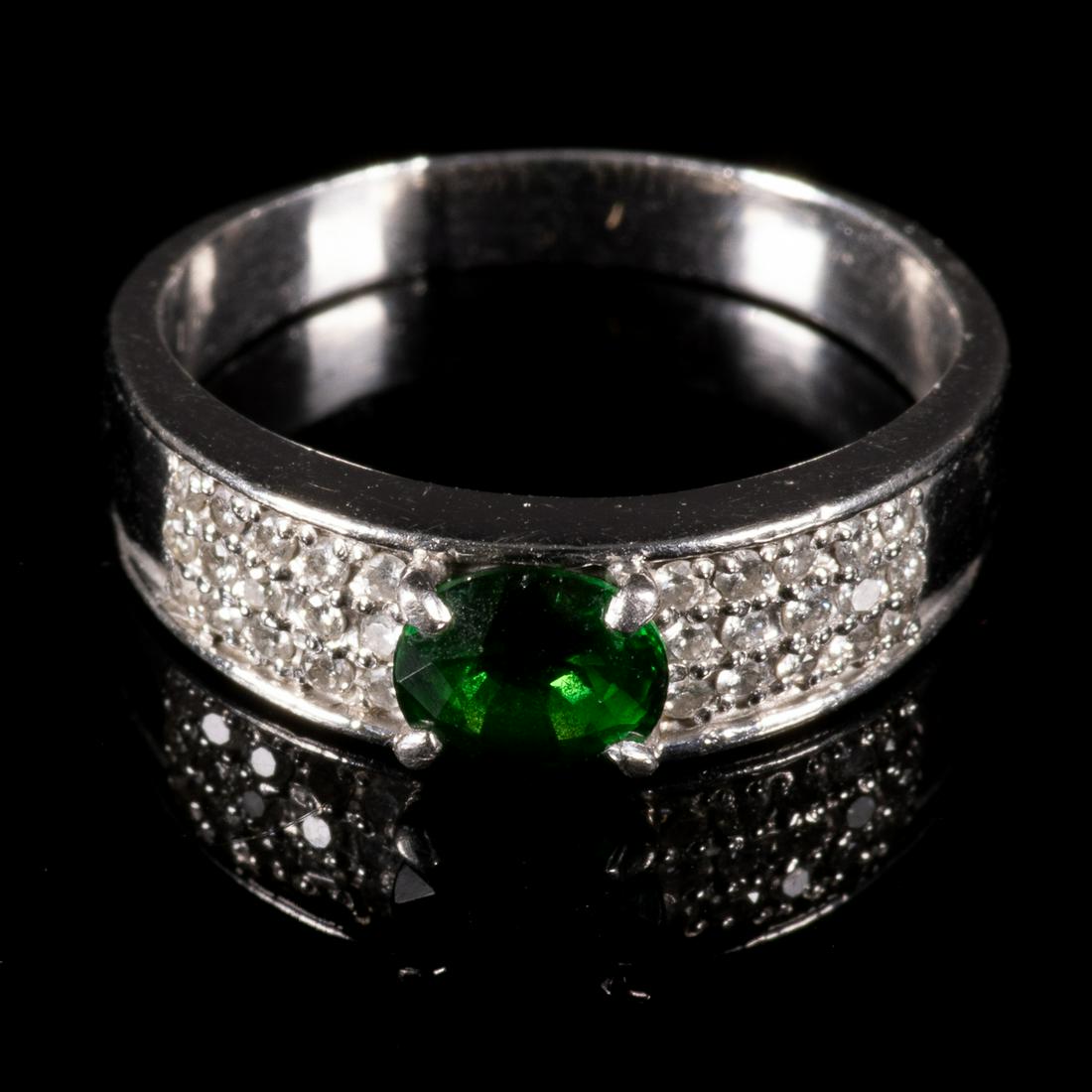Platinum 0.70ct Green Garnet & Diamond Ring: Please study all photographs carefully to get an accurate representation of the item. Please message us for information on dimensions/condition report. We offer in-house shipping internationally (US a