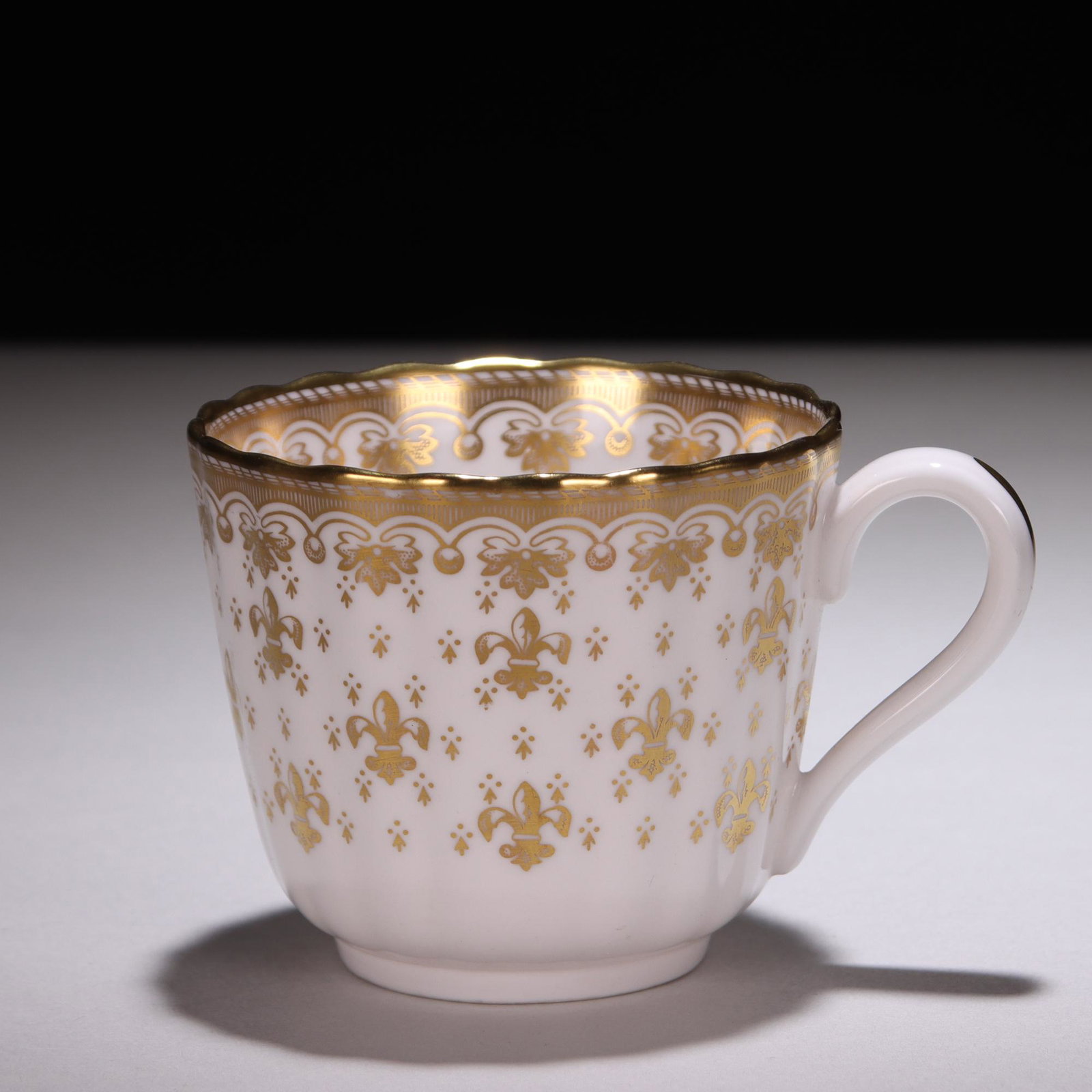 Spode 24 KT Gold Porcelain Fleur de Lis Teacup: Please study all photographs carefully to get an accurate representation of the item. Please message us for information on dimensions/condition report. We offer in-house shipping internationally (US a