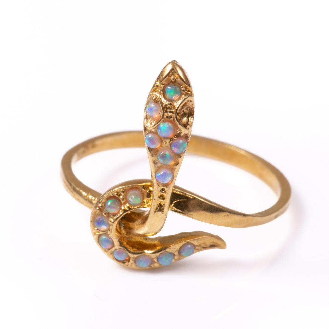 Victorian Opal Snake Ring: Please study all photographs carefully to get an accurate representation of the item. Please message us for information on dimensions/condition report. We offer in-house shipping internationally (US a