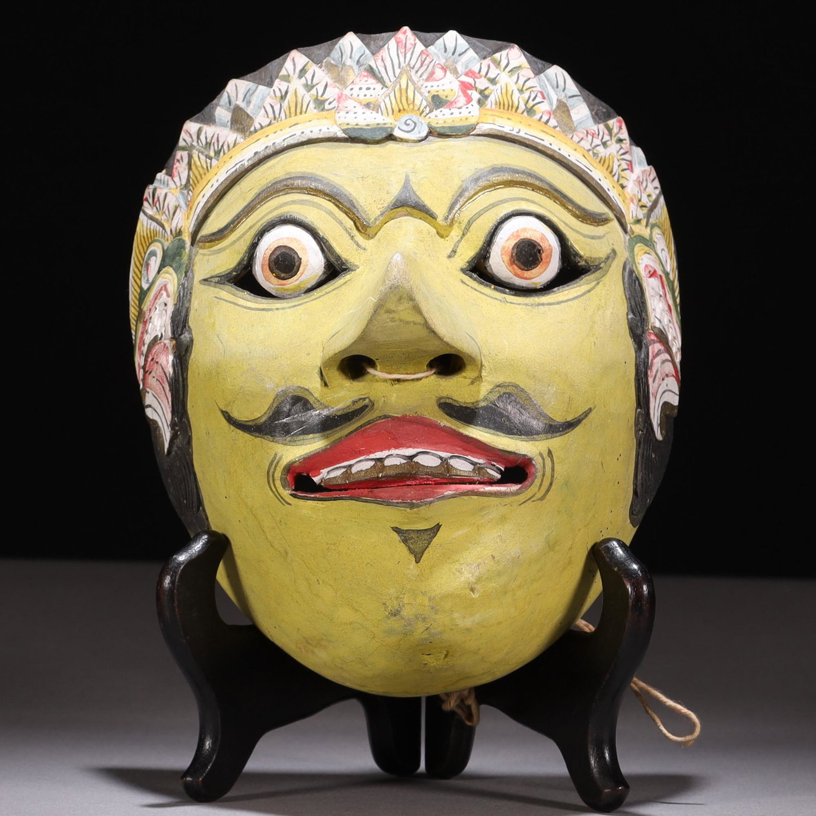Indonesian Bali Carved Wood Mask: MEASURING APPROX 19 X 15 X 10.5CM. Please carefully study all photographs to get an accurate idea of the object. In good condition, as seen. Shipping is in-house and we ship internationally to US and 