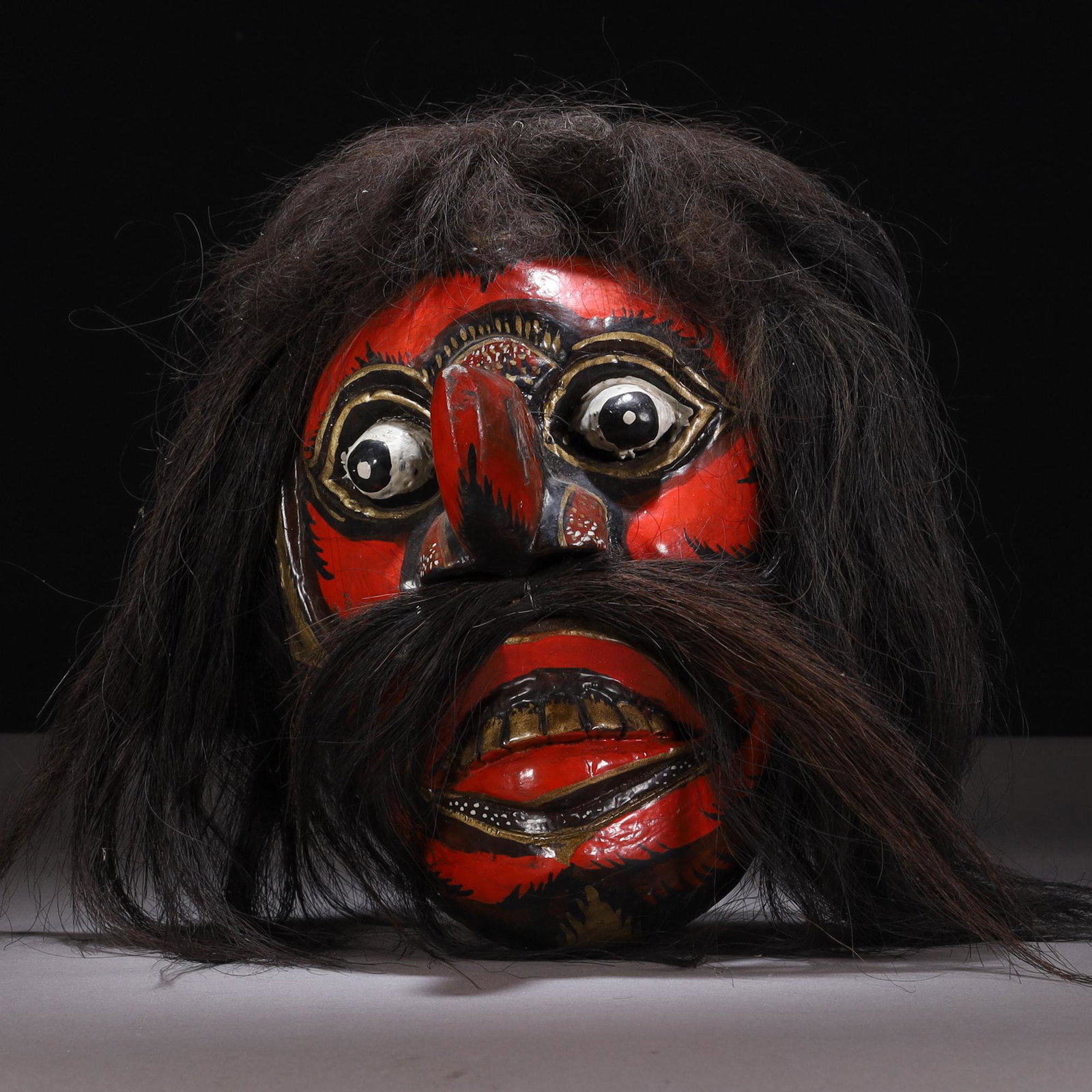 Indonesian Bali Carved Wood Mask: MEASURING APPROX 25 X 18 X 15.5CM. Please carefully study all photographs to get an accurate idea of the object. In good condition, as seen. Shipping is in-house and we ship internationally to US and 