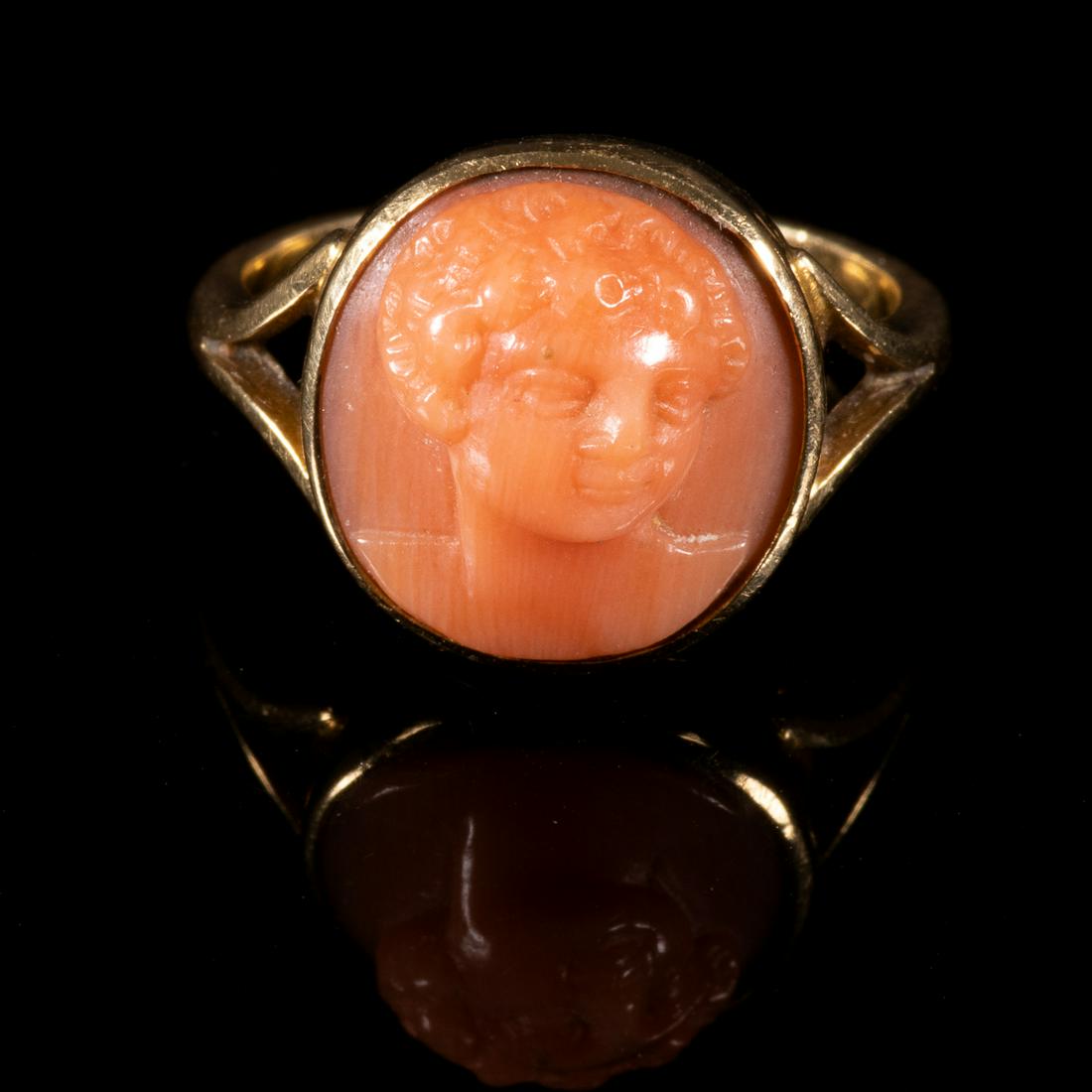 18 Kt. Gold Carved Classical Head Coral Ring: Please study all photographs carefully to get an accurate representation of the item. Please message us for information on dimensions/condition report. We offer in-house shipping internationally (US a
