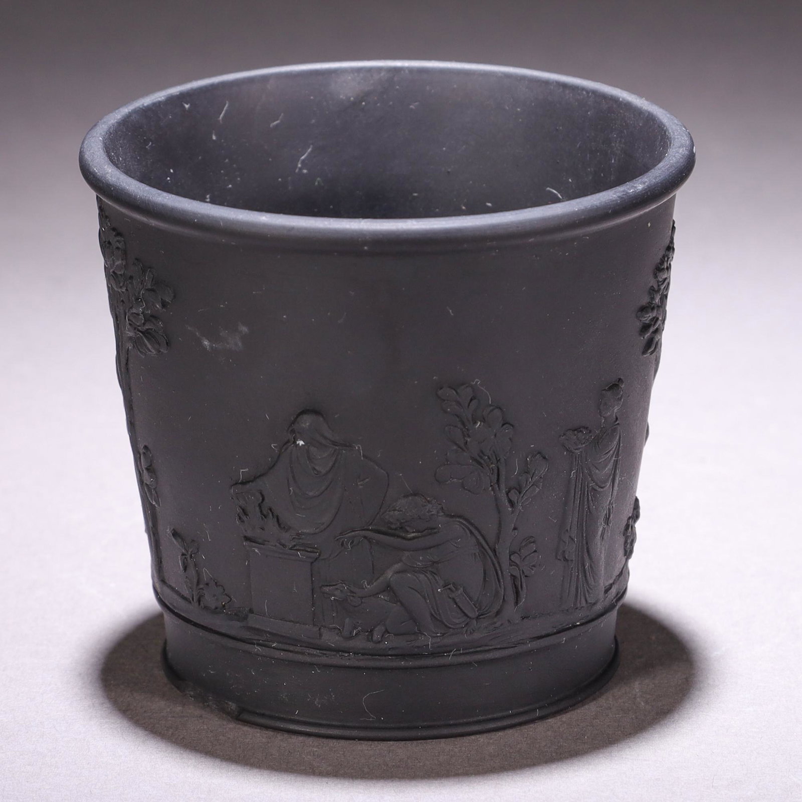 Wedgwood Black Basalt Relief Neoclassical Vase: MEASURING APPROX 6.5 X 7CM. Please carefully study all photographs to get an accurate idea of the object. In good condition, as seen. Shipping is in-house and we ship internationally to US and rest of