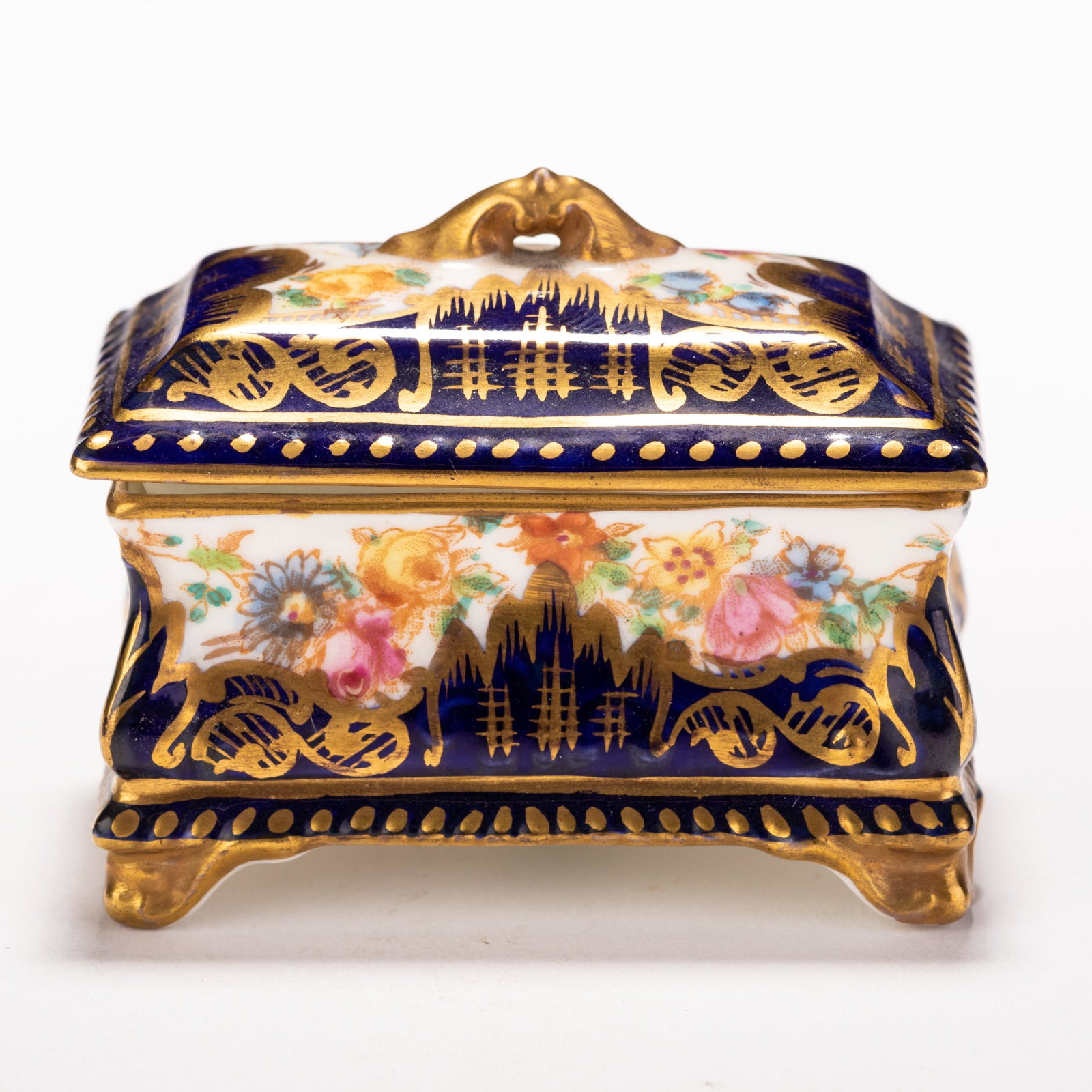 Crown Staffordshire 24 KT Gold Cobalt Porcelain Trinket Box: MEASURING APPROX 6 X 3.6 X 5.2CM. Please follow us on Instagram to stay updated with our current and future auctions: @albinus_auctions. Study all photographs carefully to get an accurate representati