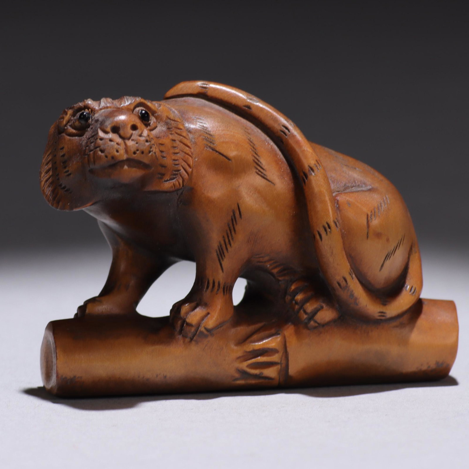 Japanese Signed Boxwood Netsuke of Tiger: MEASURING APPROX 4.7 x 3.5cm. Please study all photographs carefully to get an accurate representation of the item. Please message us for information on dimensions/condition report. We offer in-house 