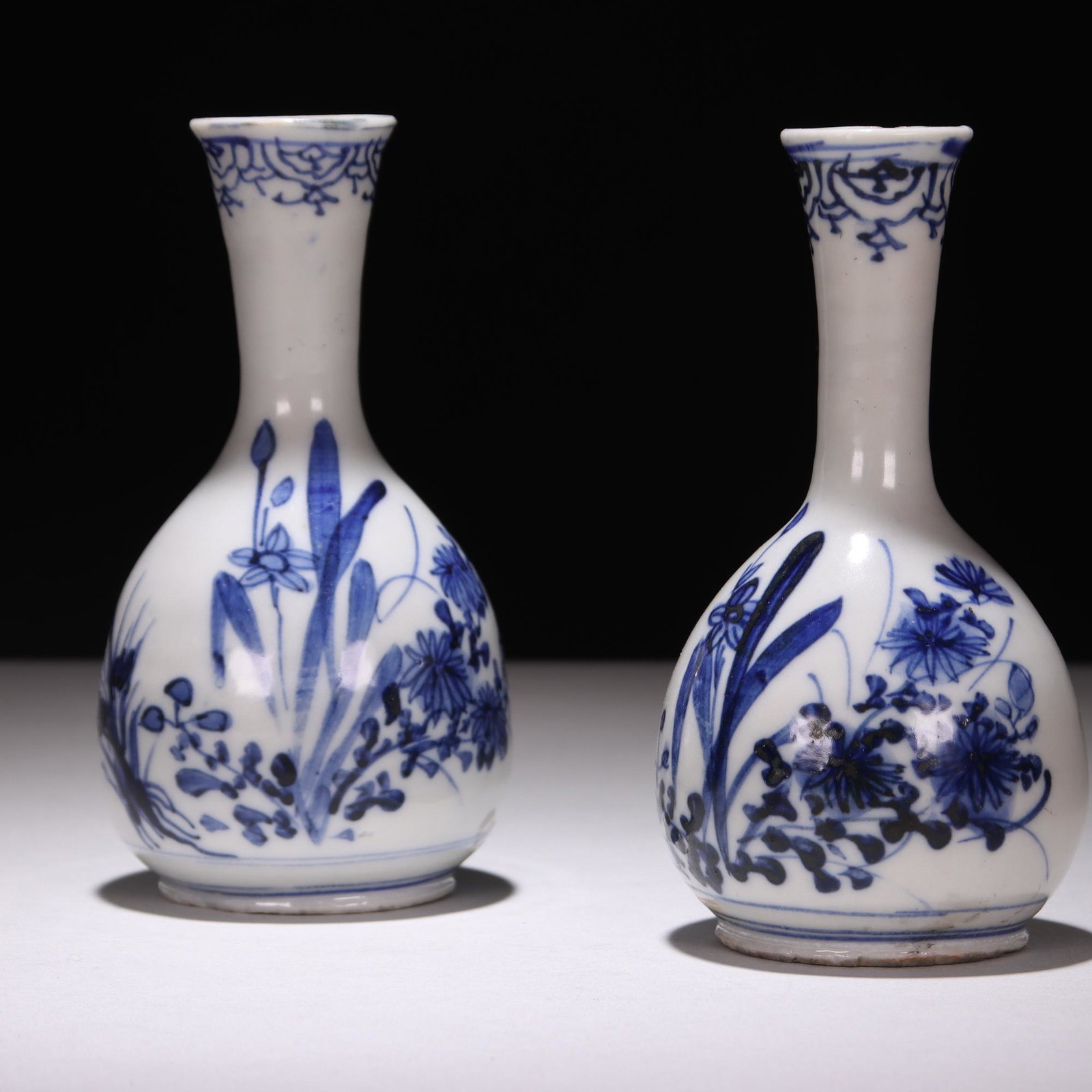 Pair of Japanese Edo Porcelain Vases: DIMENSIONS APPROX 12 x 6.5cm. Please study all photographs carefully to get an accurate representation of the item. Please message us for information on dimensions/condition report. We offer in-house 