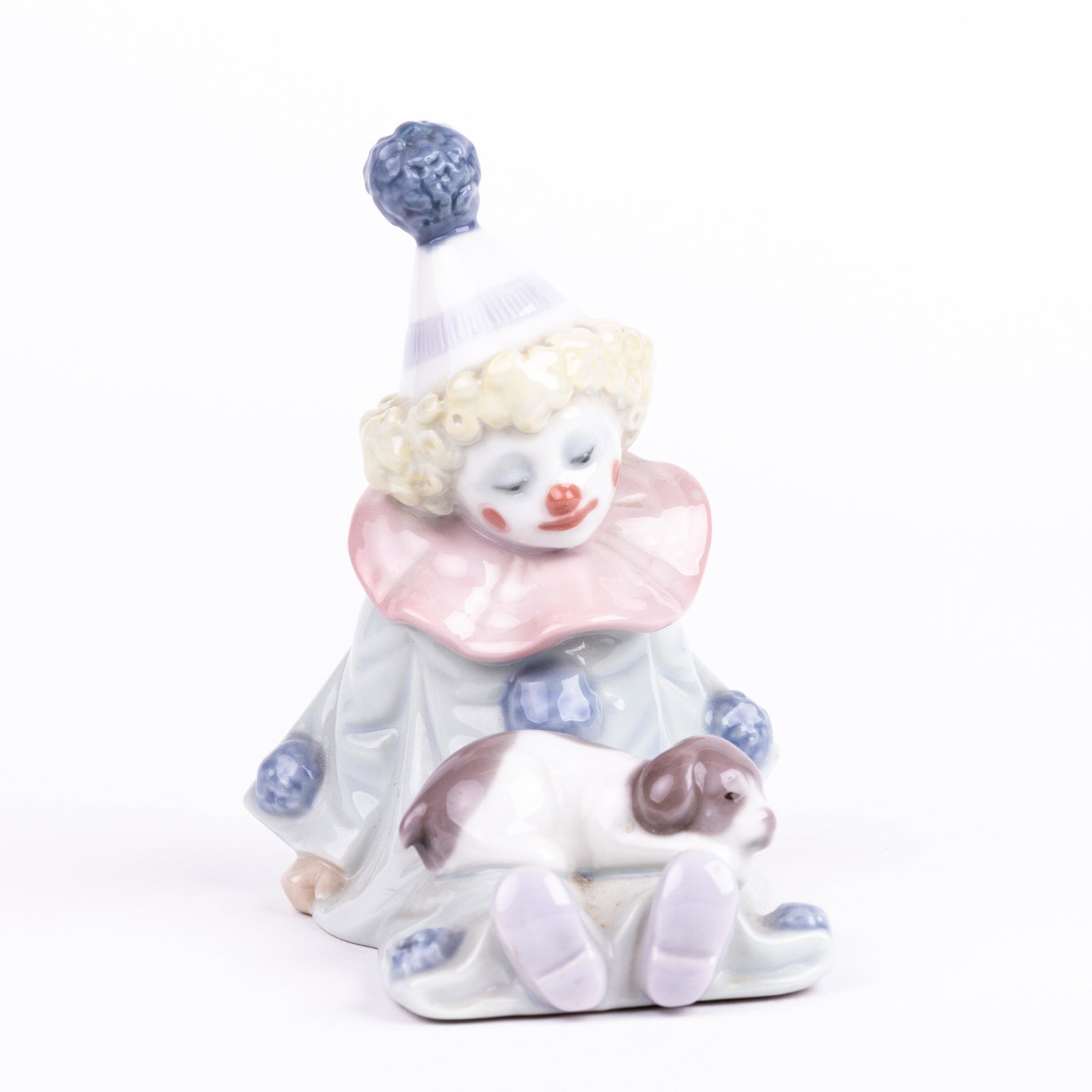 Lladro Fine Porcelain 5277 Circus Figure "Pierrot with Puppy": DIMENSIONS APPROX 11.5x9x6CM. Please carefully study all photographs to get an accurate idea of the object. In good condition, as seen. Shipping is in-house and we ship internationally to US and rest 