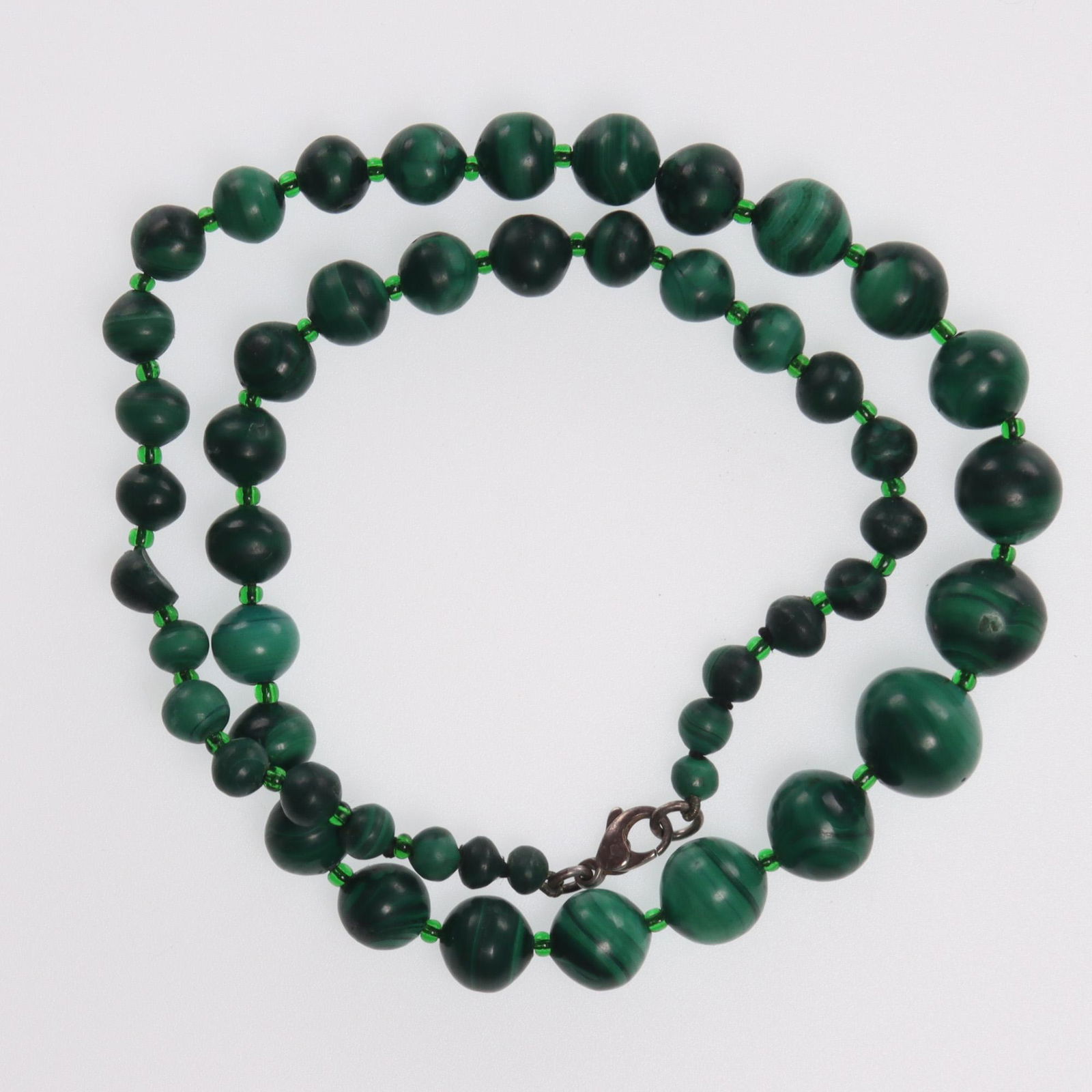 Art Deco Malachite Necklace: MEASURING APPROX 54.5cm. Please study all photographs carefully to get an accurate representation of the item. Please message us for information on dimensions/condition report. We offer in-house shipp