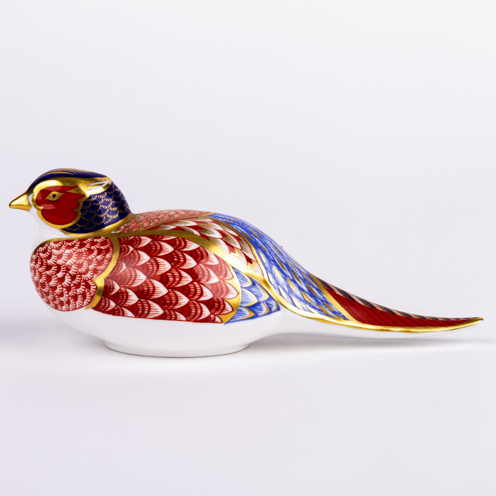 Royal Crown Derby 24KT Gold Porcelain Paperweight Pheasant: DIMENSIONS APPROX 6.5x17x7CM. Please carefully study all photographs to get an accurate idea of the object. In good condition, as seen. Shipping is in-house and we ship internationally to US and rest 