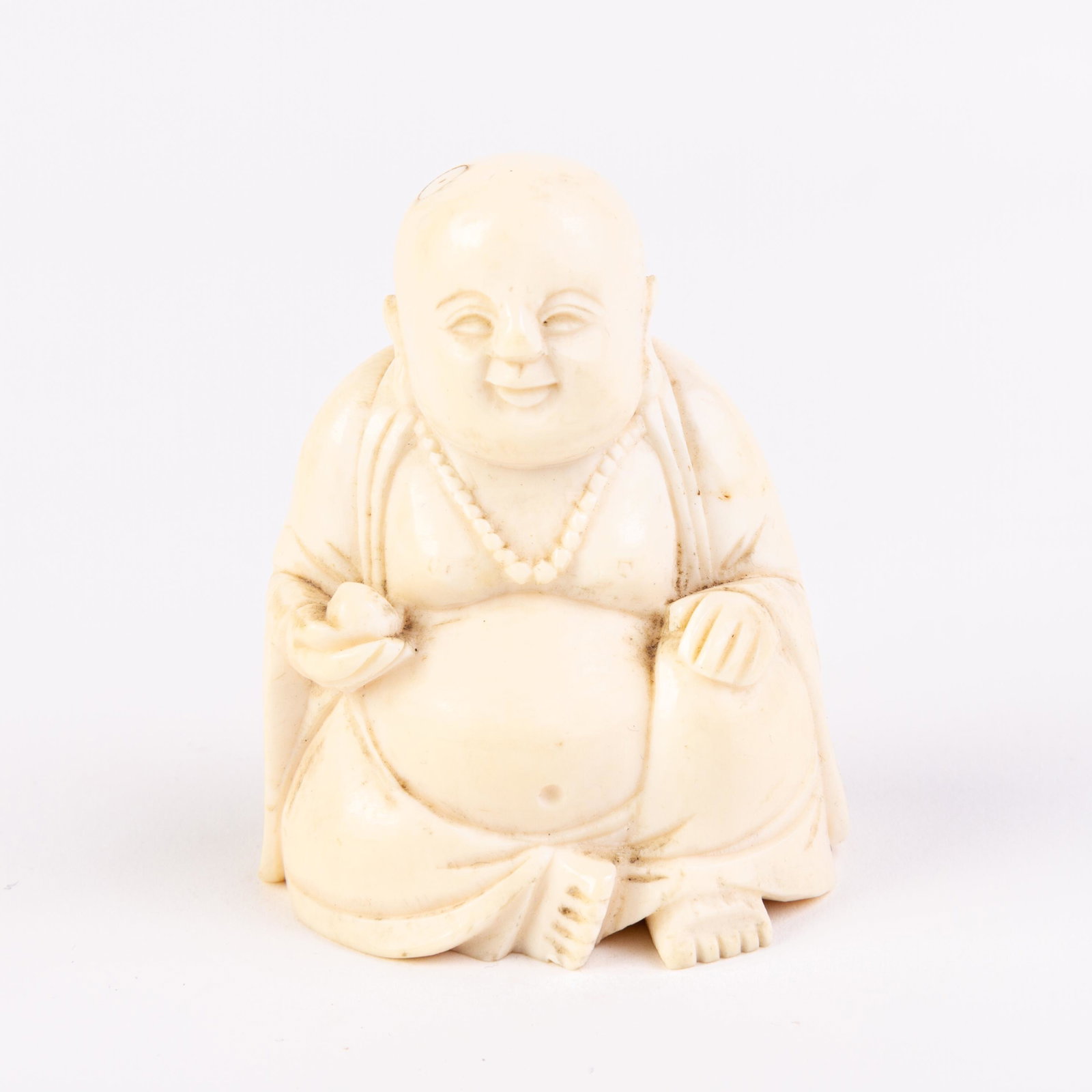Japanese Carved Buddha Okimono Figure Meiji: DIMENSIONS APPROX 6x4.5x4.5CM. Please carefully study all photographs to get an accurate idea of the object. In good condition, as seen. Shipping is in-house and we ship internationally to US and rest