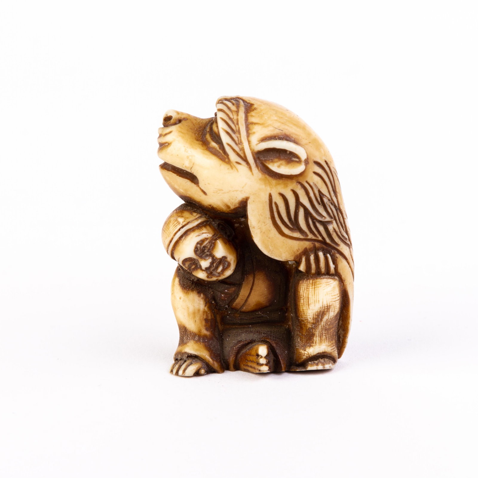 Japanese Boxwood Netsuke of Man Disguised as a Tiger: DIMENSIONS APPROX 4.5x3x1CM. Please carefully study all photographs to get an accurate idea of the object. In good condition, as seen. Shipping is in-house and we ship internationally to US and rest o