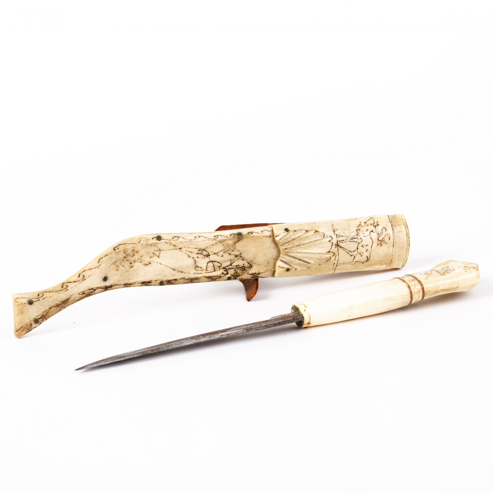 Inuit Carved Reindeer Bone Dagger & Scabbard: DIMENSIONS APPROX 24.5x2x3CM. Please carefully study all photographs to get an accurate idea of the object. In good condition, as seen. Shipping is in-house and we ship internationally to US and rest 