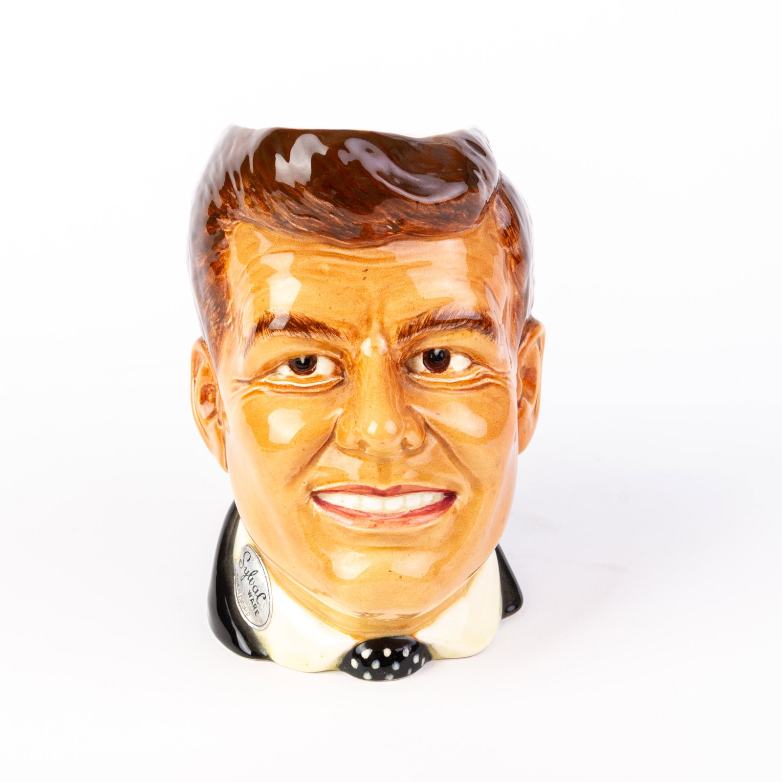 John. F. Kennedy Sylvac Character Ceramic Mug: DIMENSIONS APPROX 16x17x9.5CM. Please carefully study all photographs to get an accurate idea of the object. In good condition, as seen. Shipping is in-house and we ship internationally to US and rest