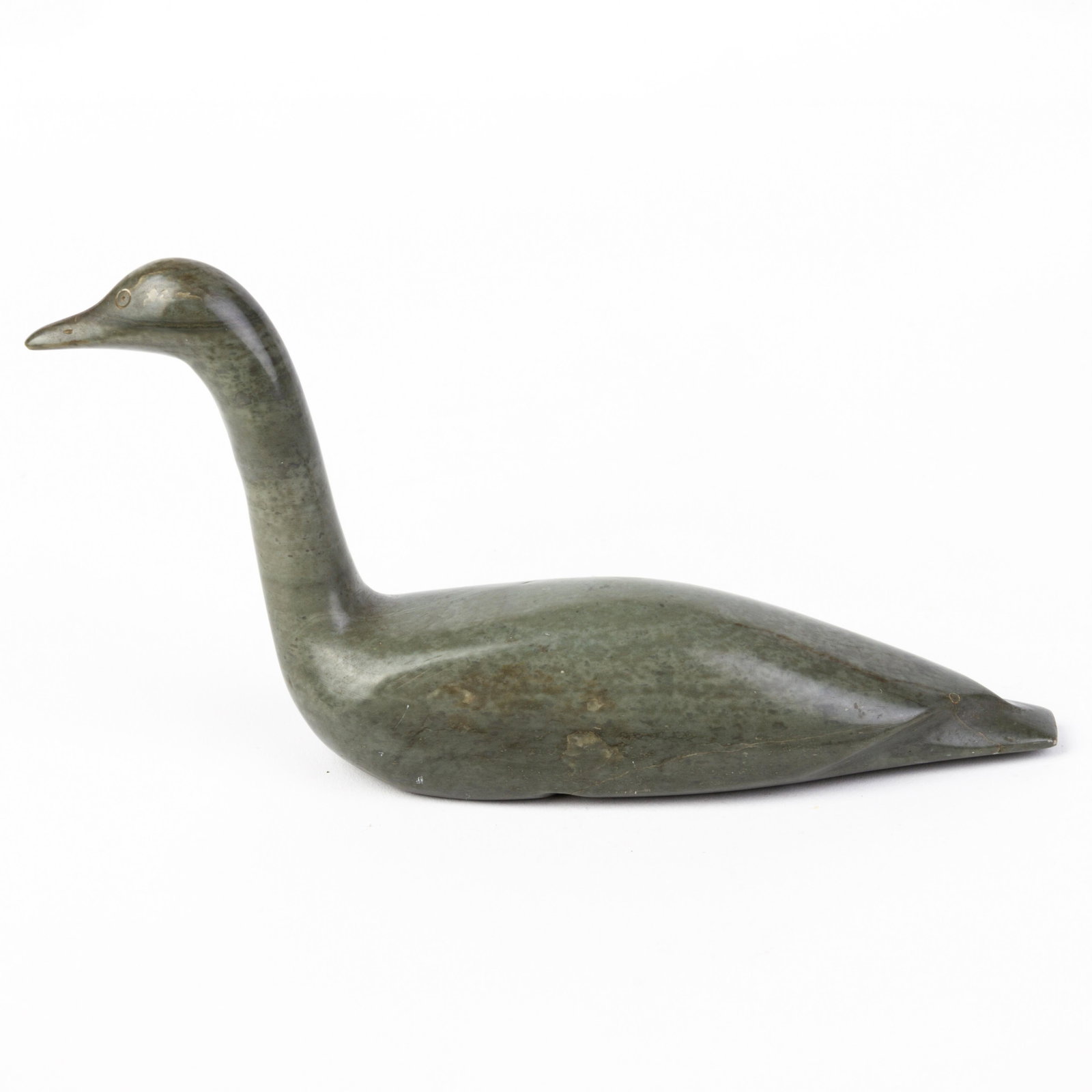 Canadian Inuit Stone Sculpture: DIMENSIONS APPROX 9x18x4CM. Please carefully study all photographs to get an accurate idea of the object. In good condition, as seen. Shipping is in-house and we ship internationally to US and rest of