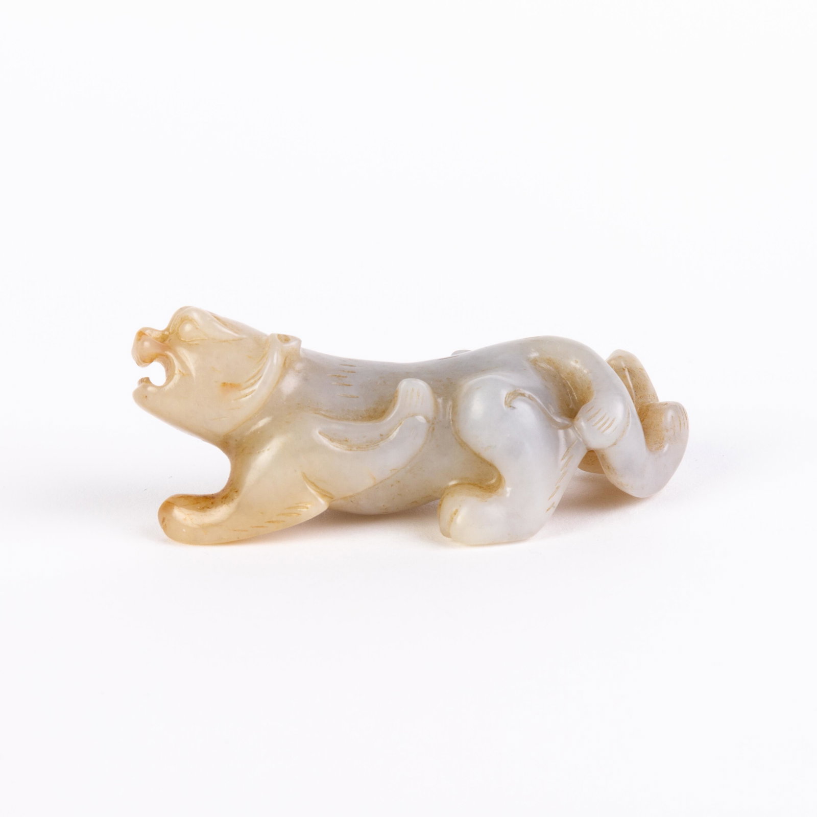 Chinese Russet Jade Carving of a Foo Dog: Please carefully study all photographs to get an accurate idea of the object. In good condition, as seen. Shipping is in-house and we ship internationally to US and rest of the world. You may follow o