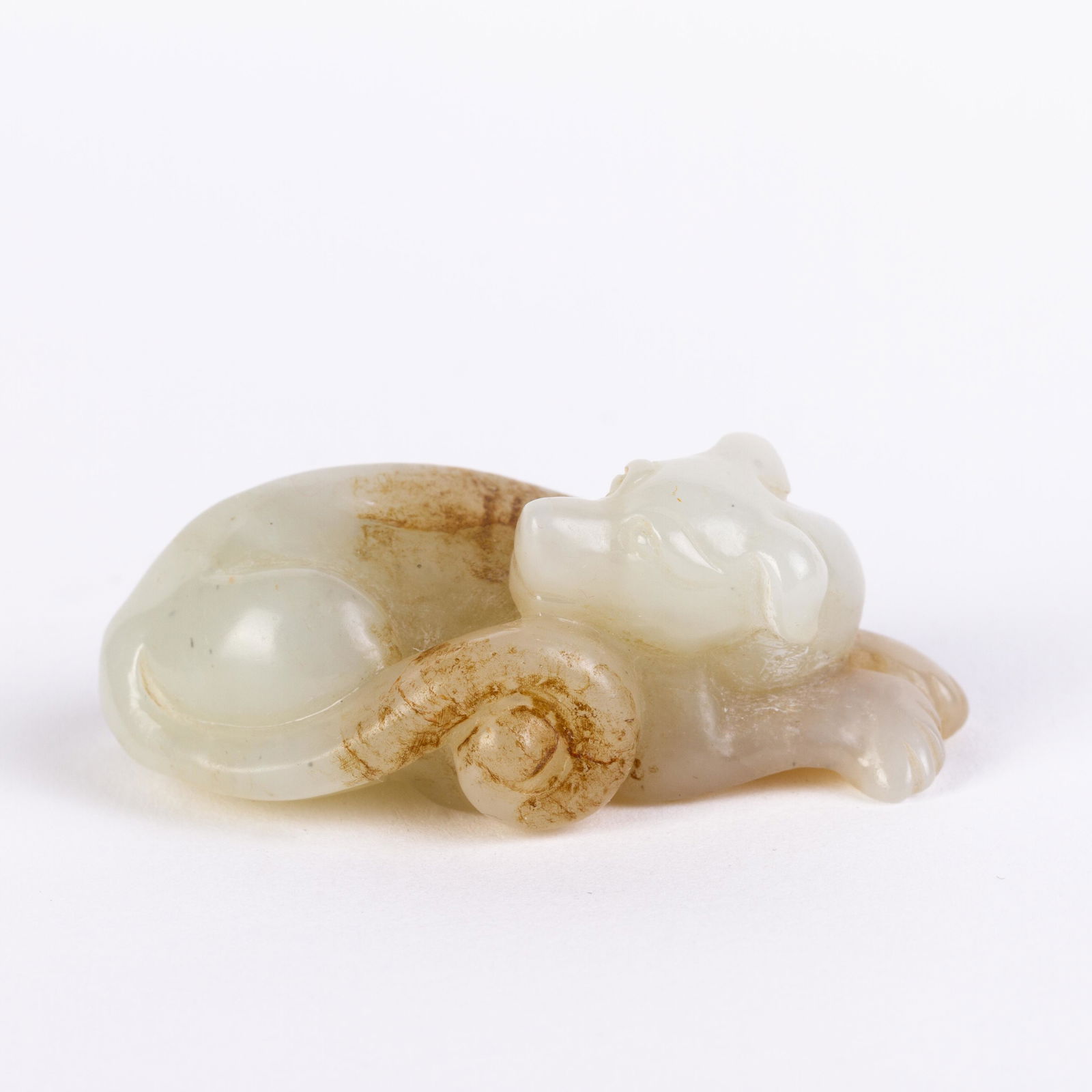 Chinese Pale Celadon Jade Carving of a Recumbent Dog: Please carefully study all photographs to get an accurate idea of the object. In good condition, as seen. Shipping is in-house and we ship internationally to US and rest of the world. You may follow o