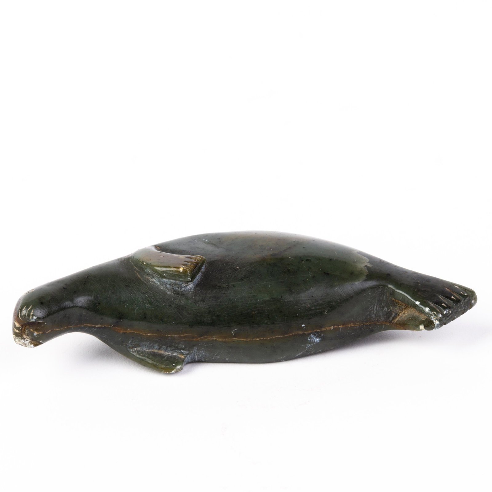 Canadian Inuit Stone Sculpture: DIMENSIONS APPROX 12x4x2CM. Please carefully study all photographs to get an accurate idea of the object. In good condition, as seen. Shipping is in-house and we ship internationally to US and rest of