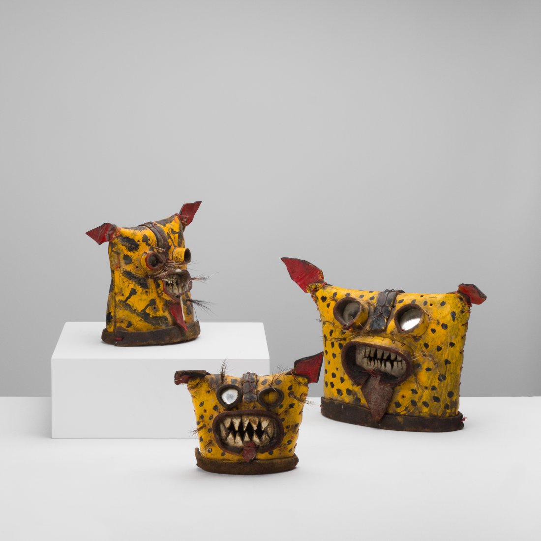 Folk Art, Zitlala Tigre Masks: Mexico, 20th century paint, hide, hair, glass largest 9 x 13 x 4; 2 lbs Group of three Zitlala Tigre Masks. Provenance: Private collection, NYC